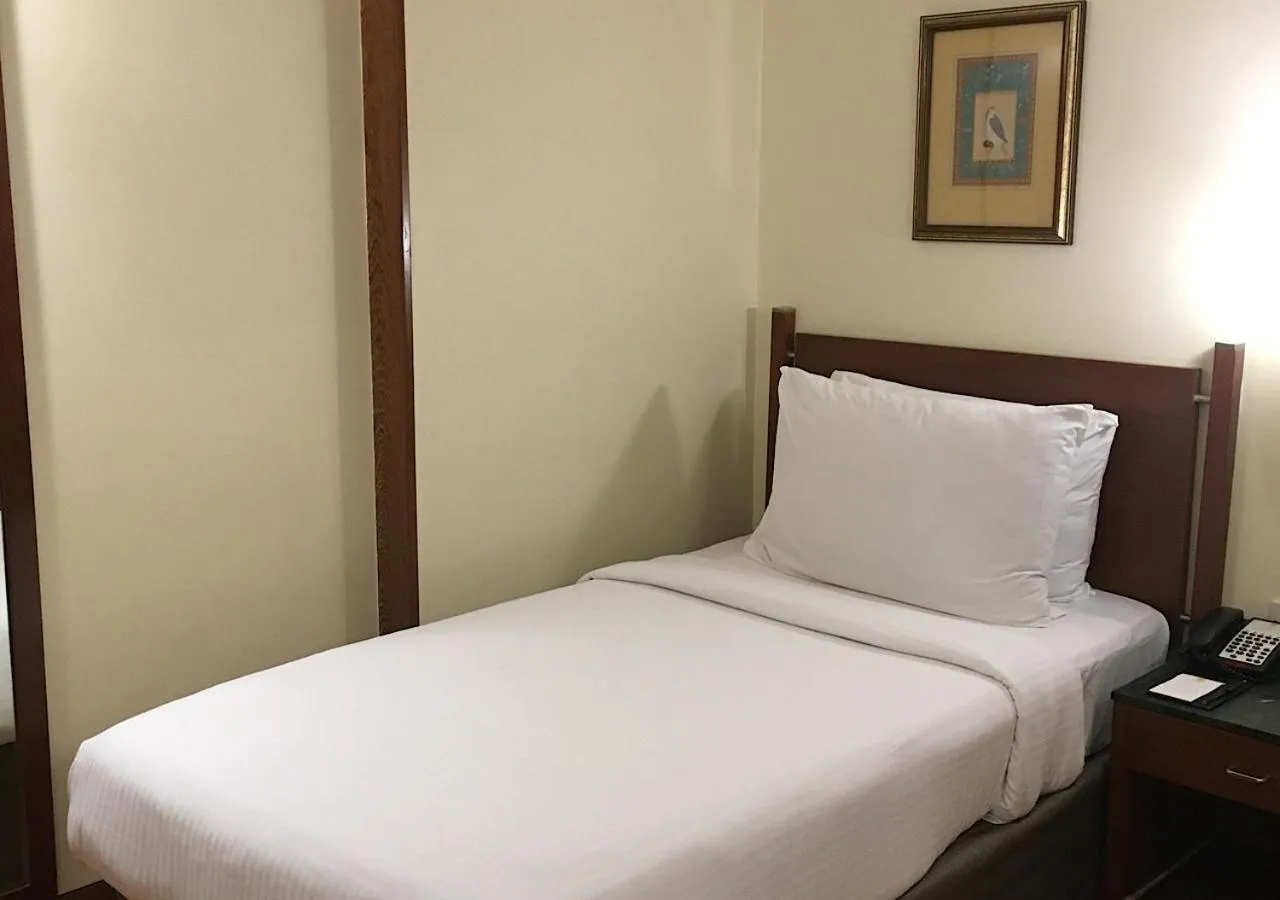 Bed in The Shalimar Hotel, Kemps Corner