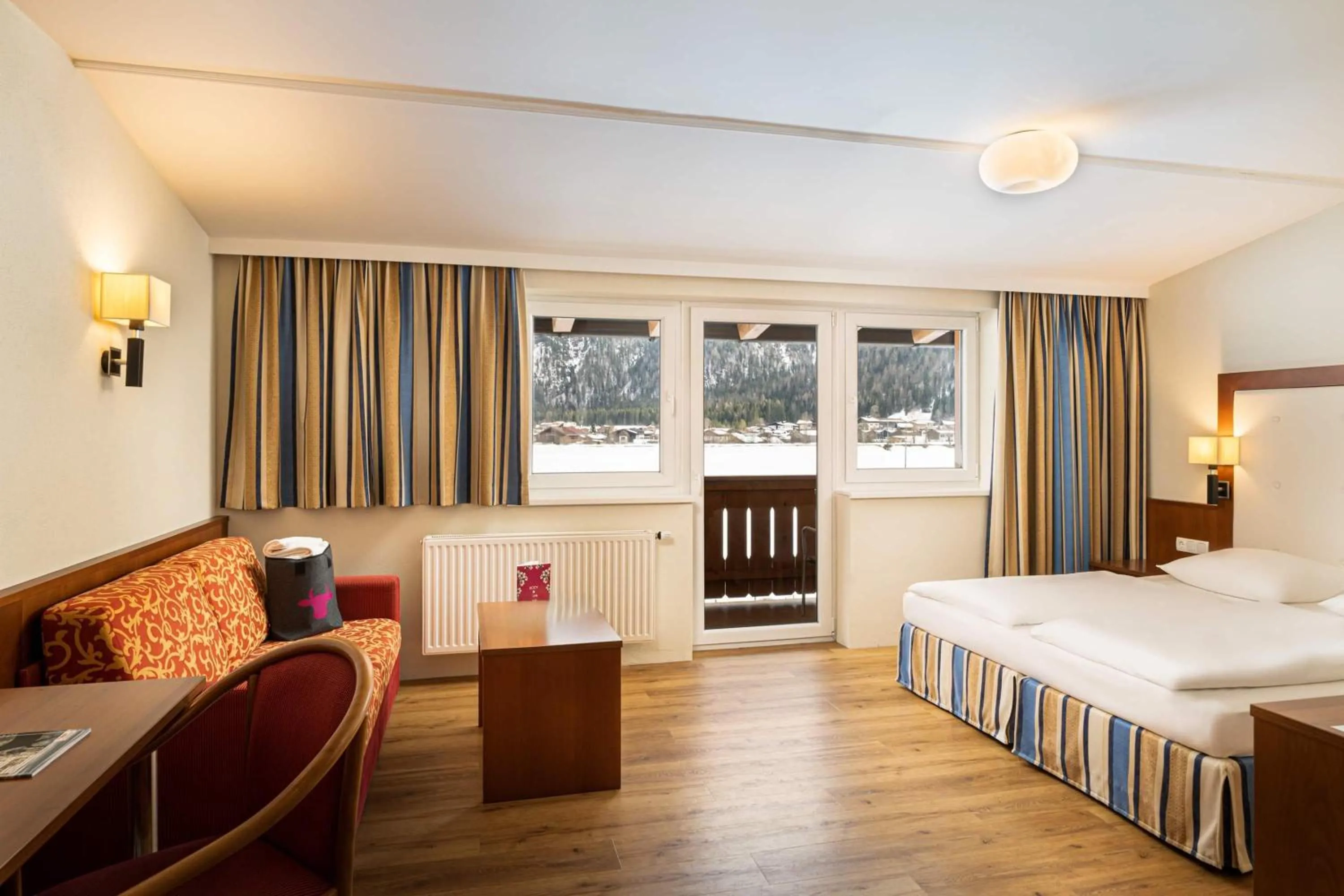 Photo of the whole room, Bed in elaya hotel steinplatte, Trademark by Wyndham