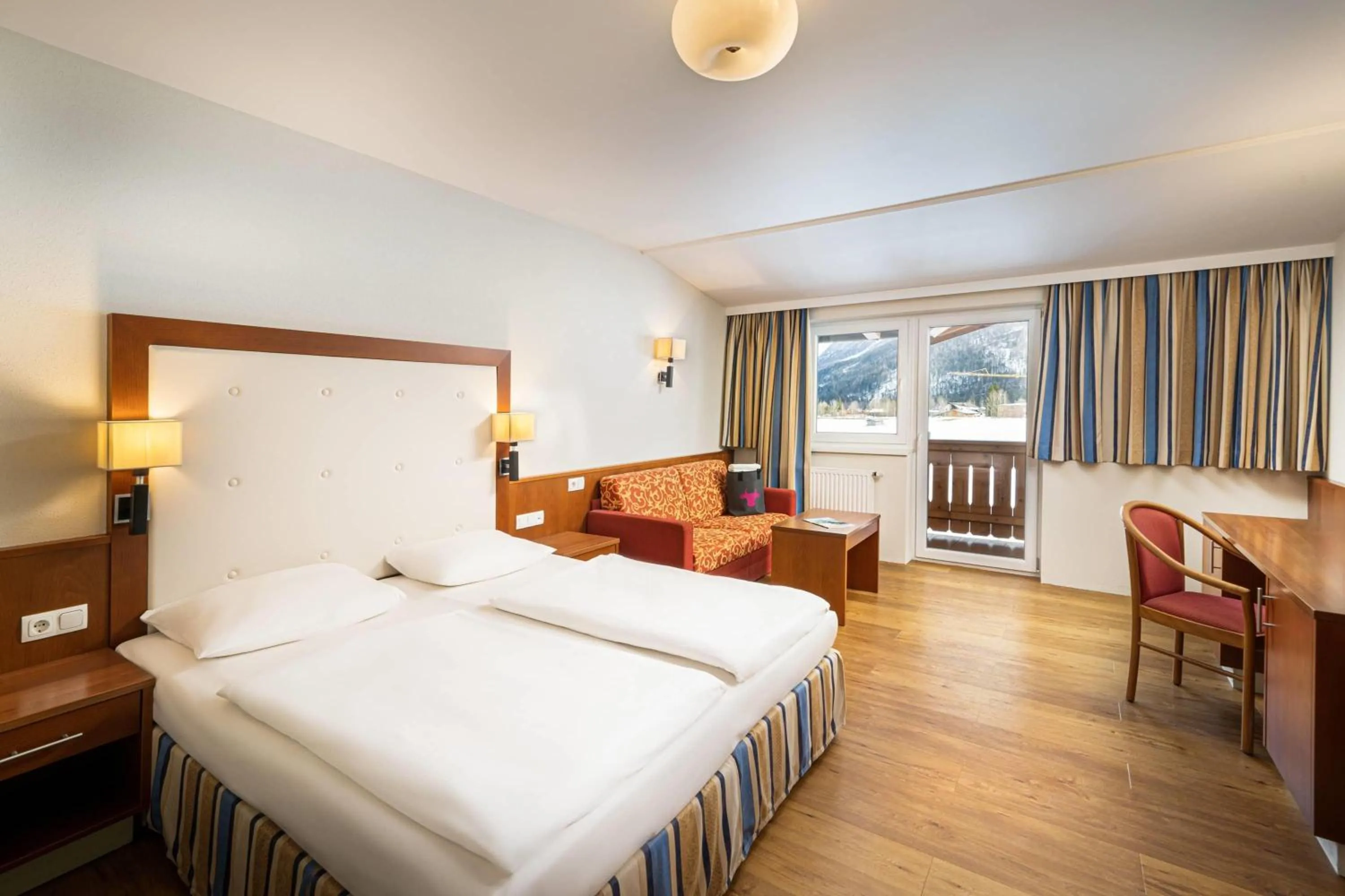 Photo of the whole room, Bed in elaya hotel steinplatte, Trademark by Wyndham