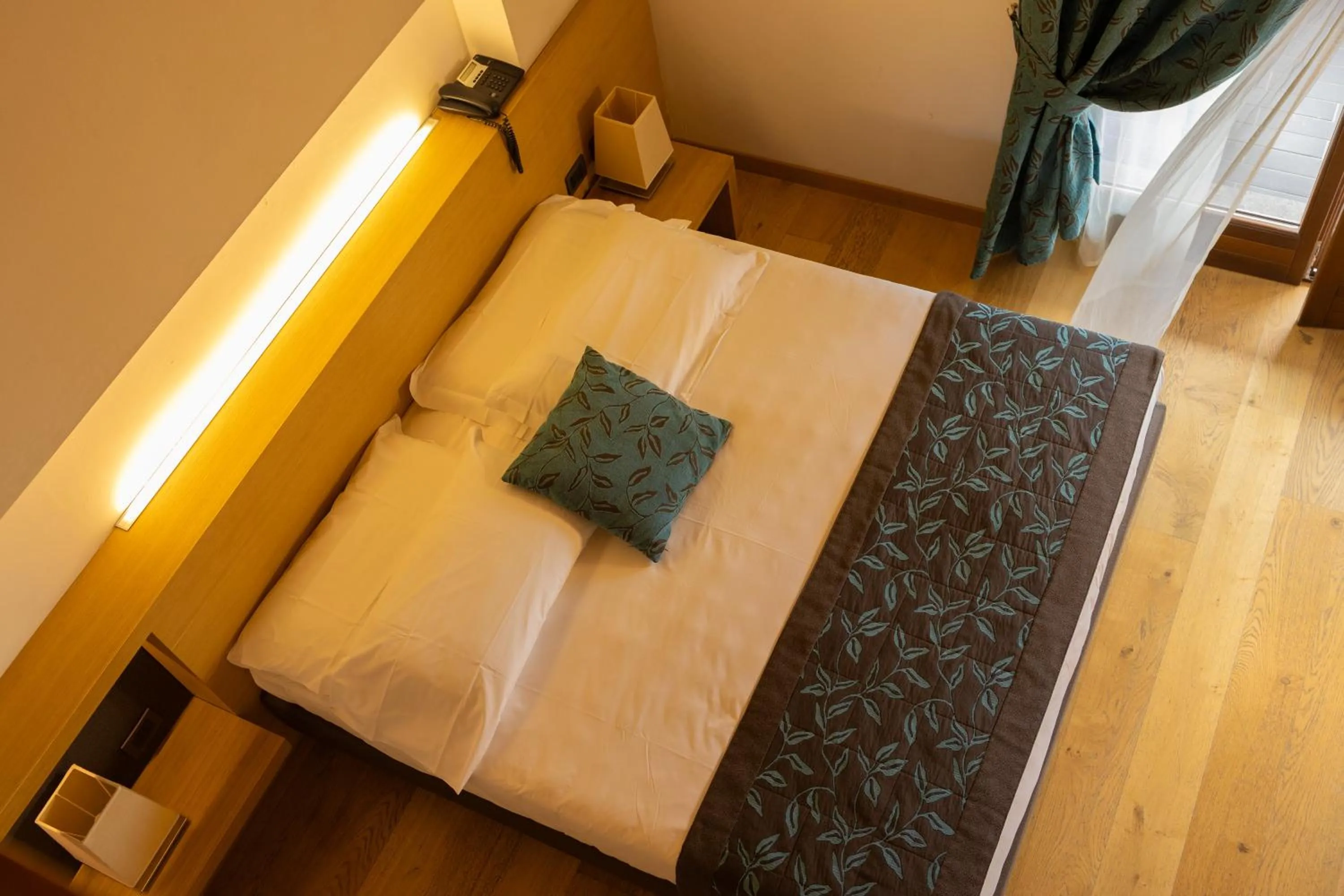 Bed in Hotel Natura