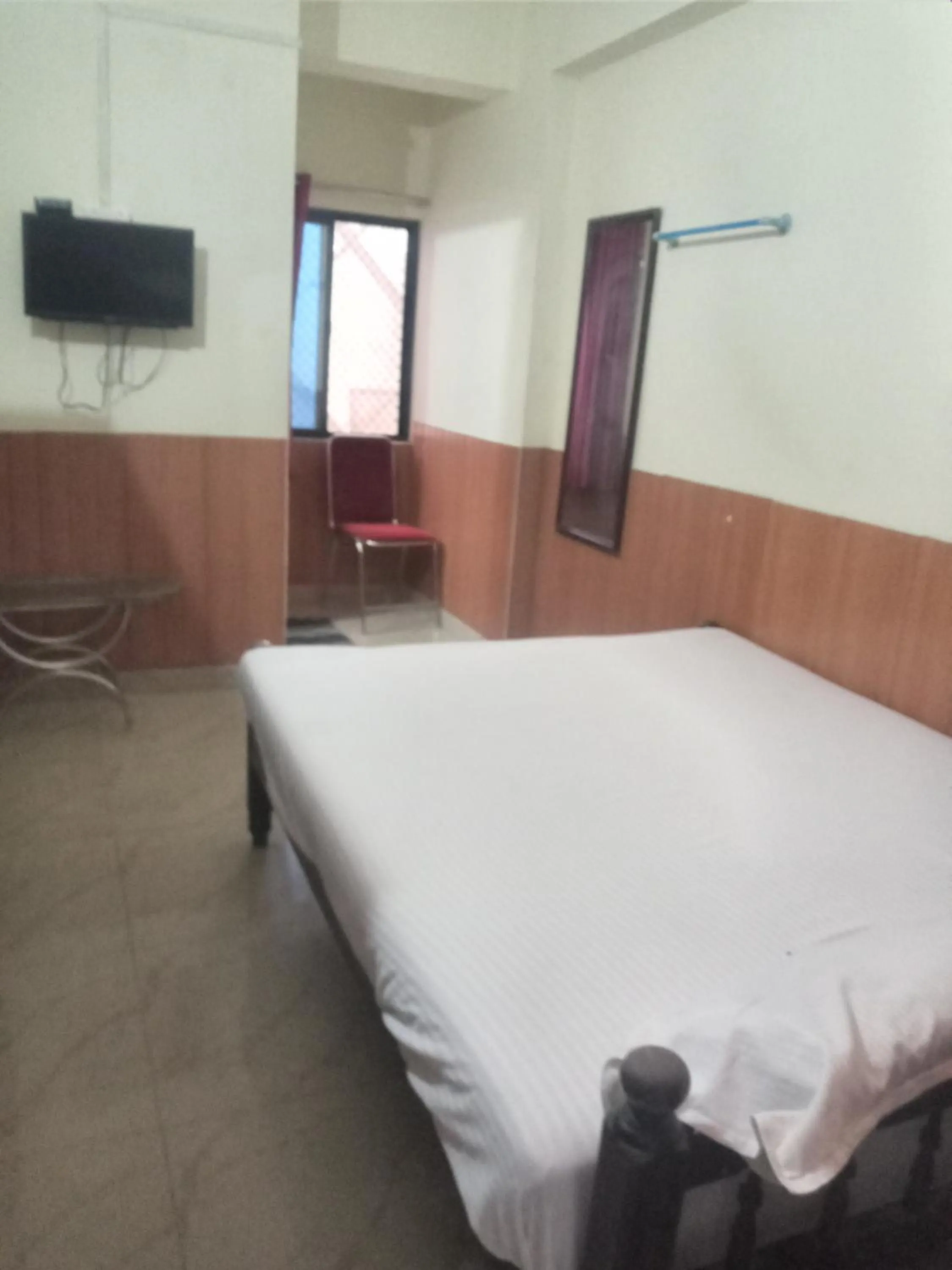 Bed in Avanti Inn