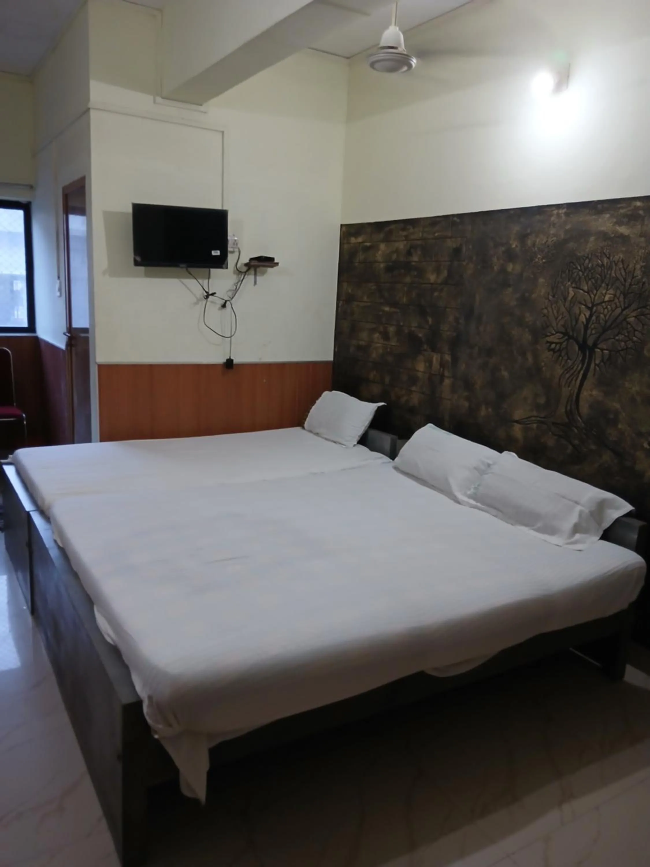 Bed in Avanti Inn