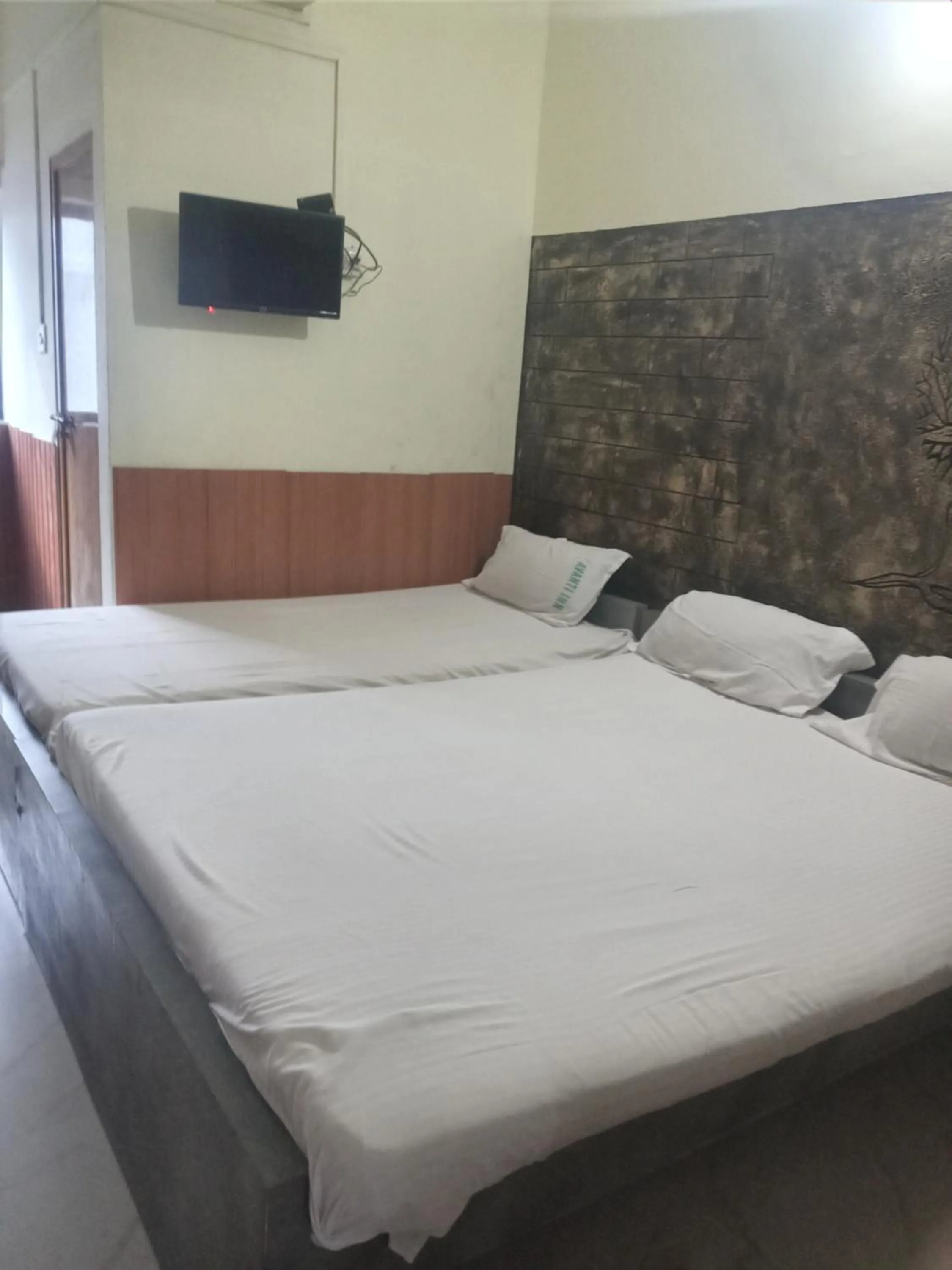 Bed in Avanti Inn
