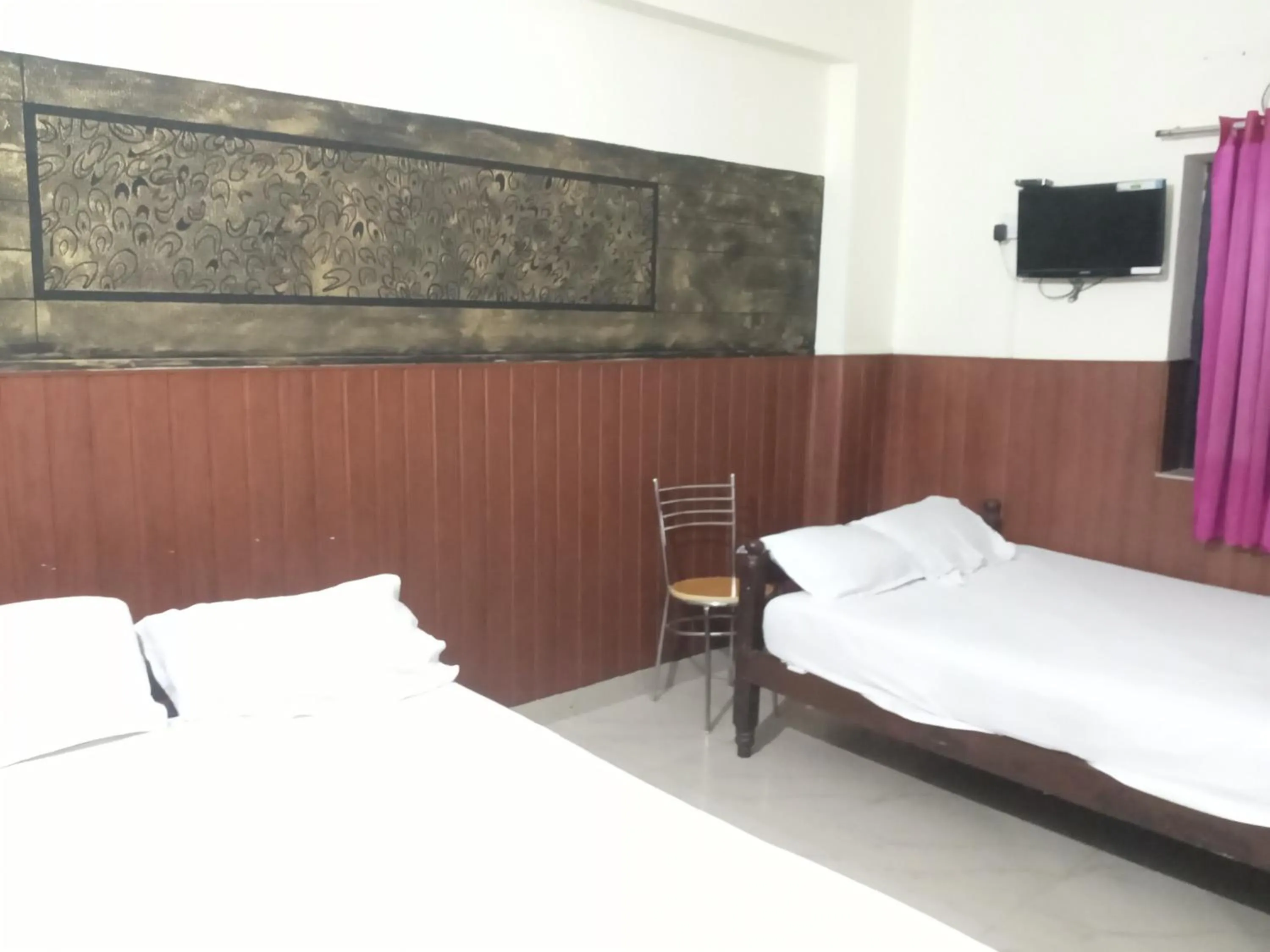 Bed in Avanti Inn