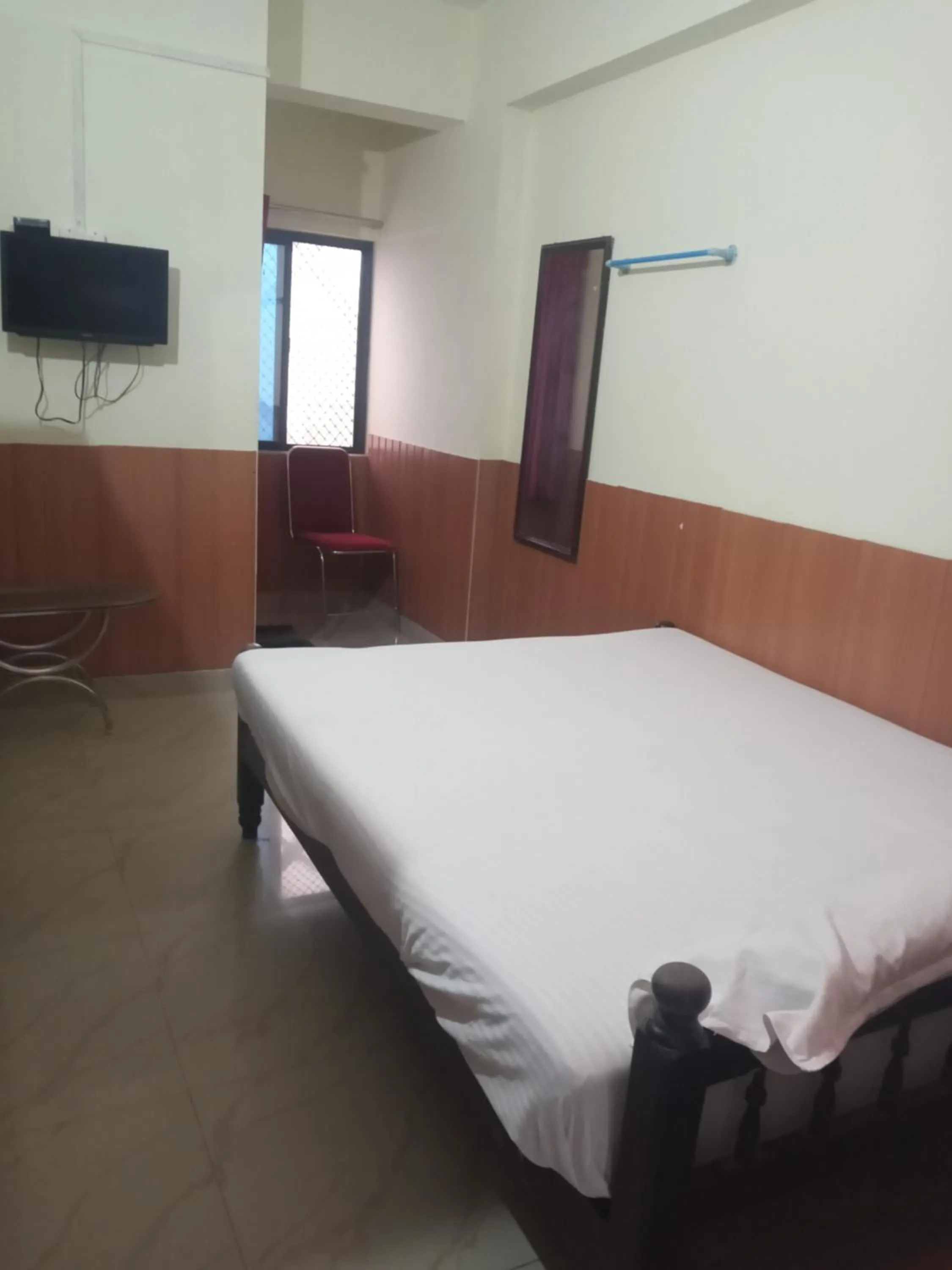 Bed in Avanti Inn