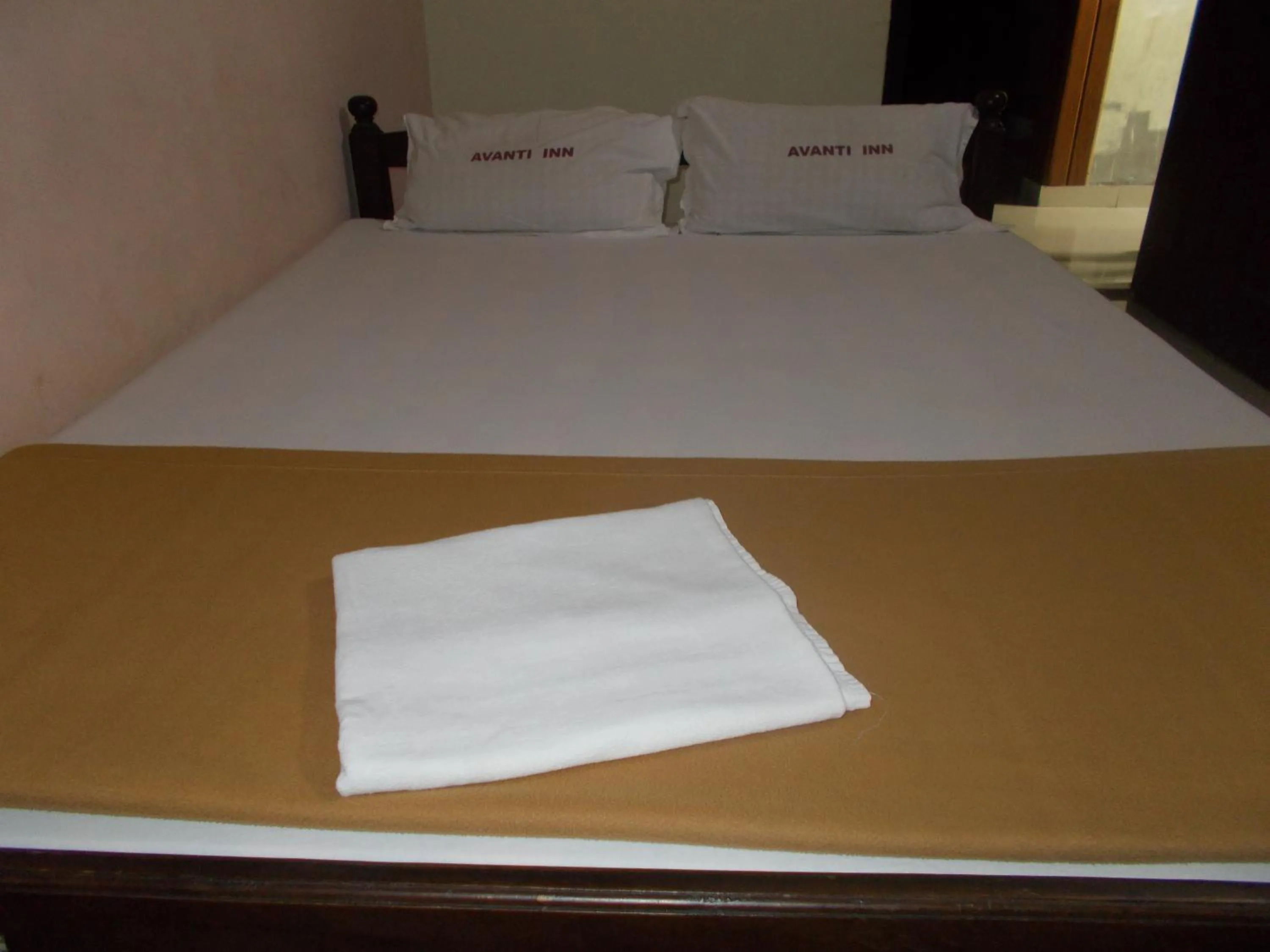 Bed in Avanti Inn