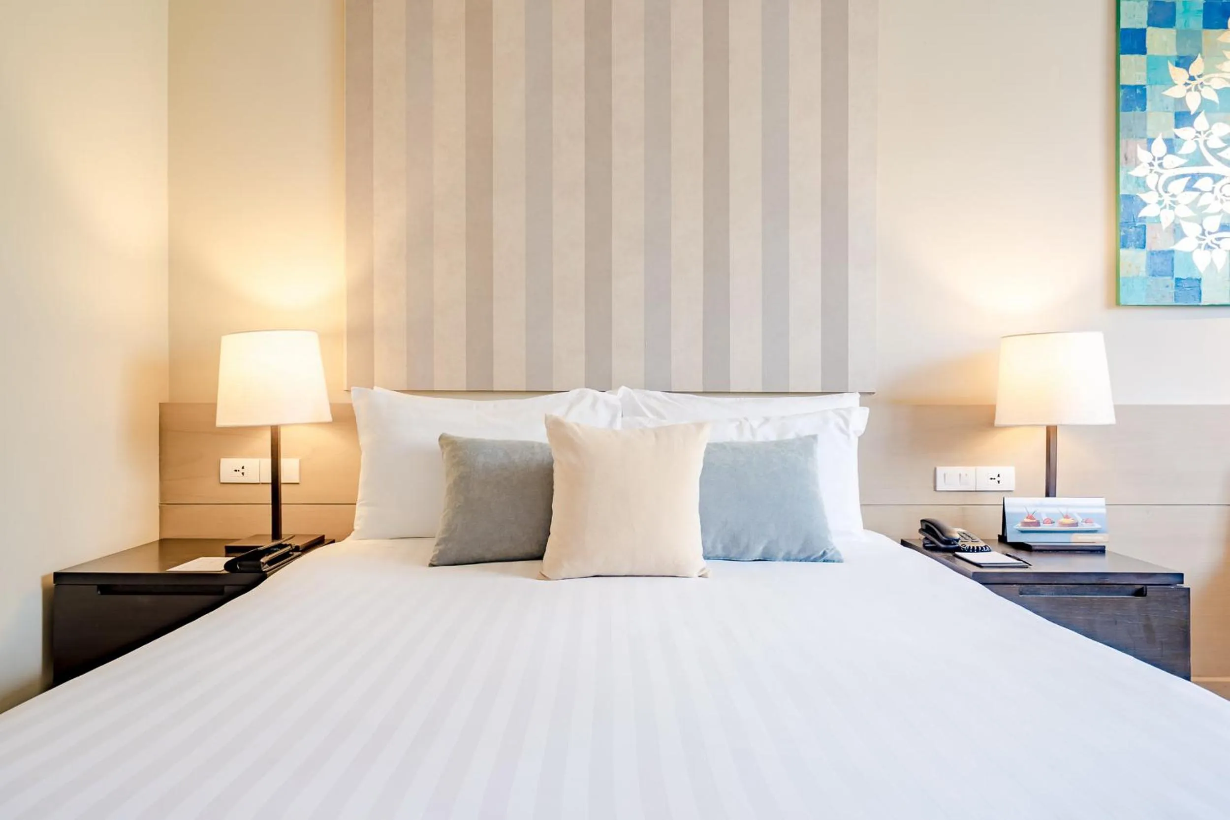 Bed in Impiana Beachfront Resort Chaweng Noi, Koh Samui