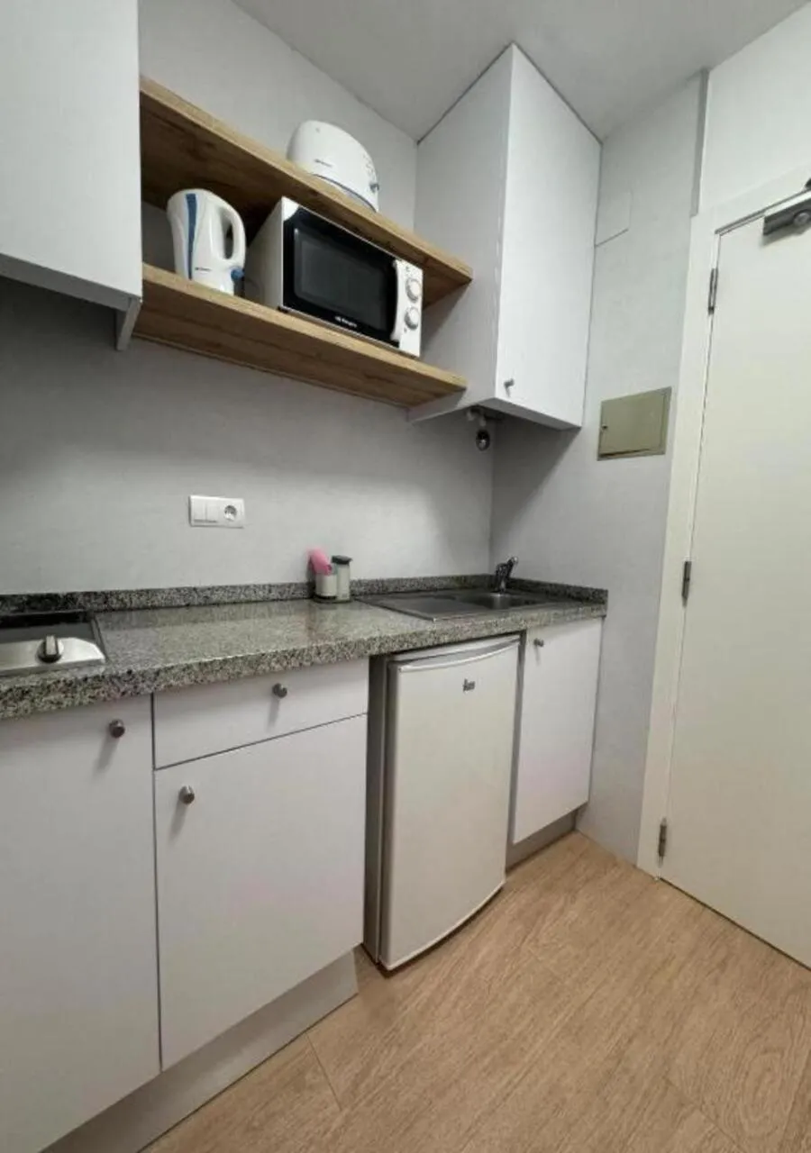 Kitchen or kitchenette in Hotel Cenit & Apts Sol y Viento