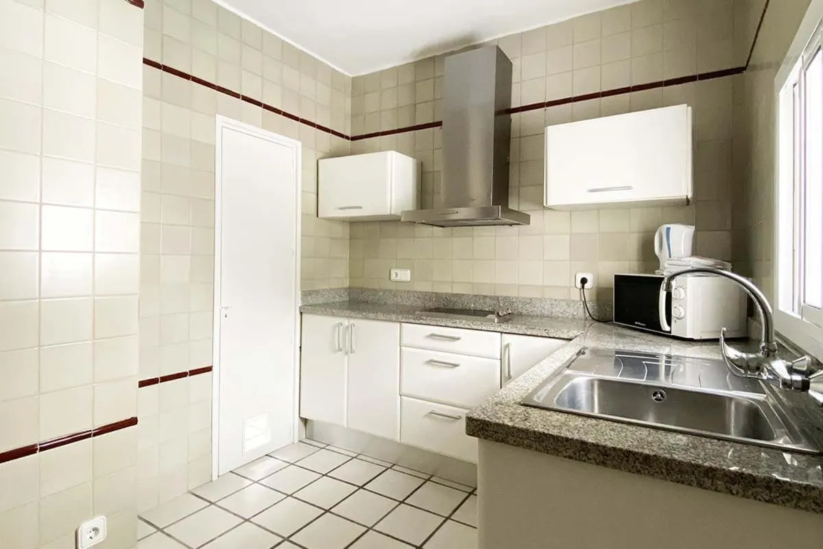 Kitchen or kitchenette in Hotel Cenit & Apts Sol y Viento