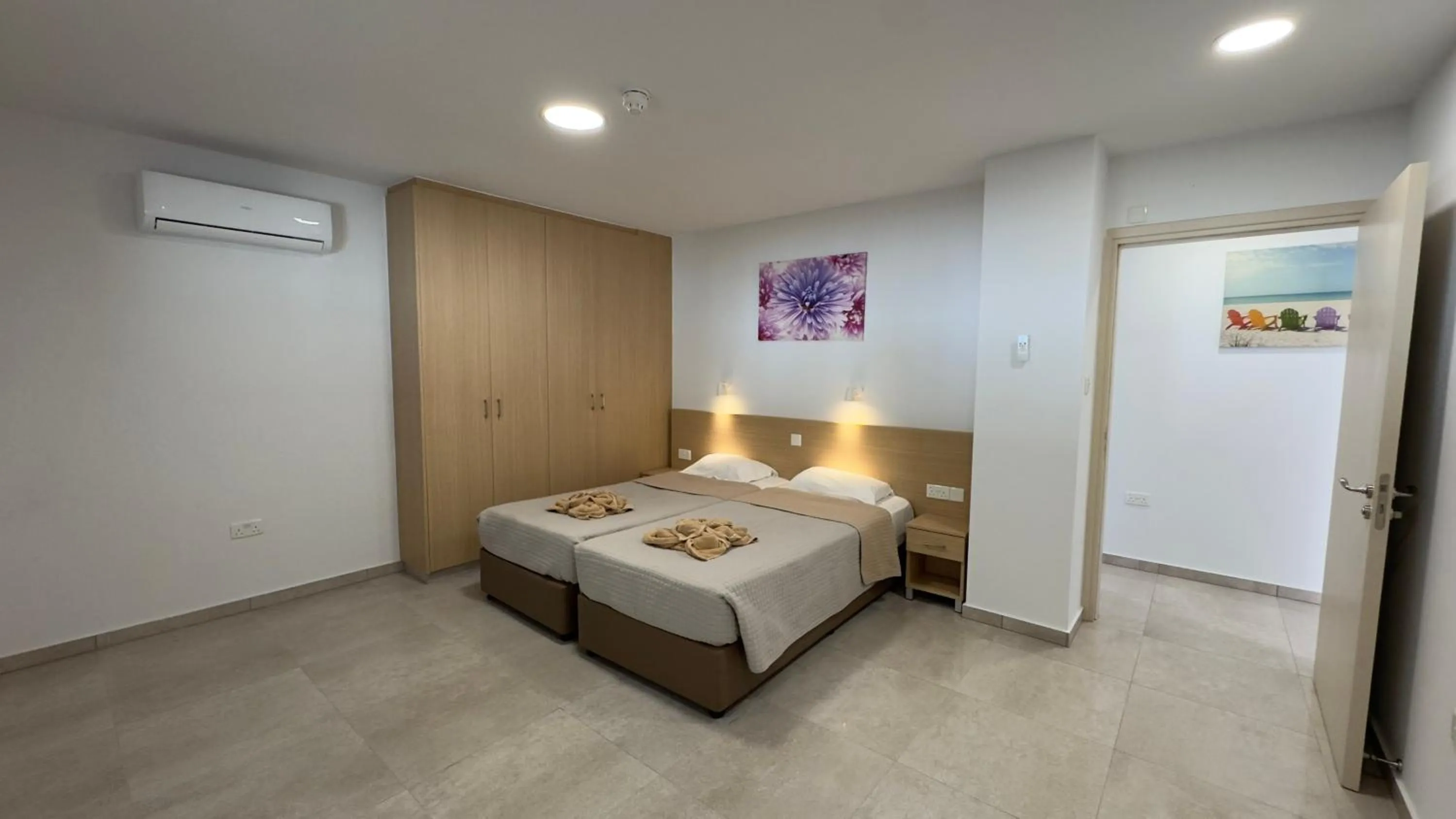 Bed in Christabelle Hotel Apartments