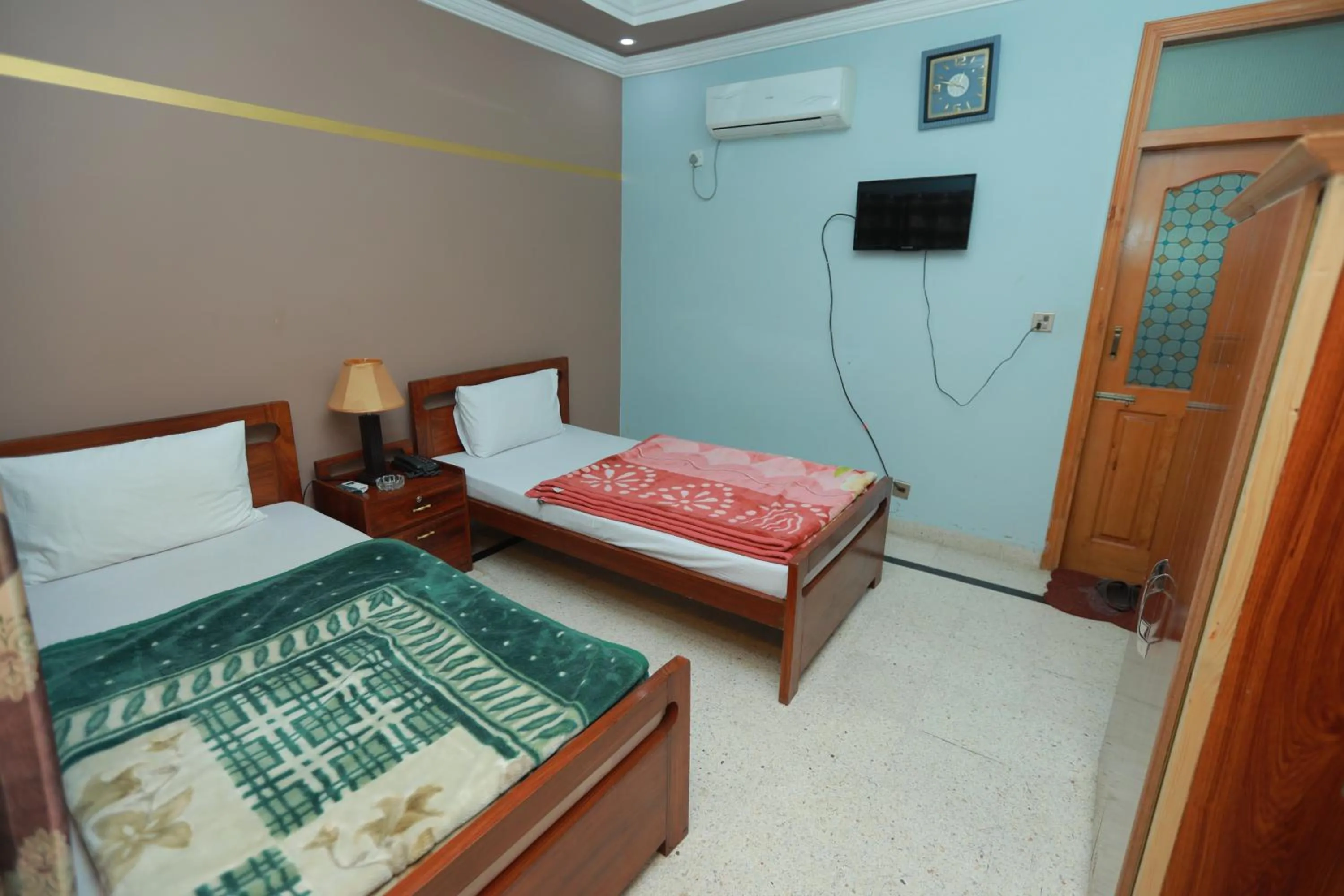 Bed in Muzaffarabad View Motel