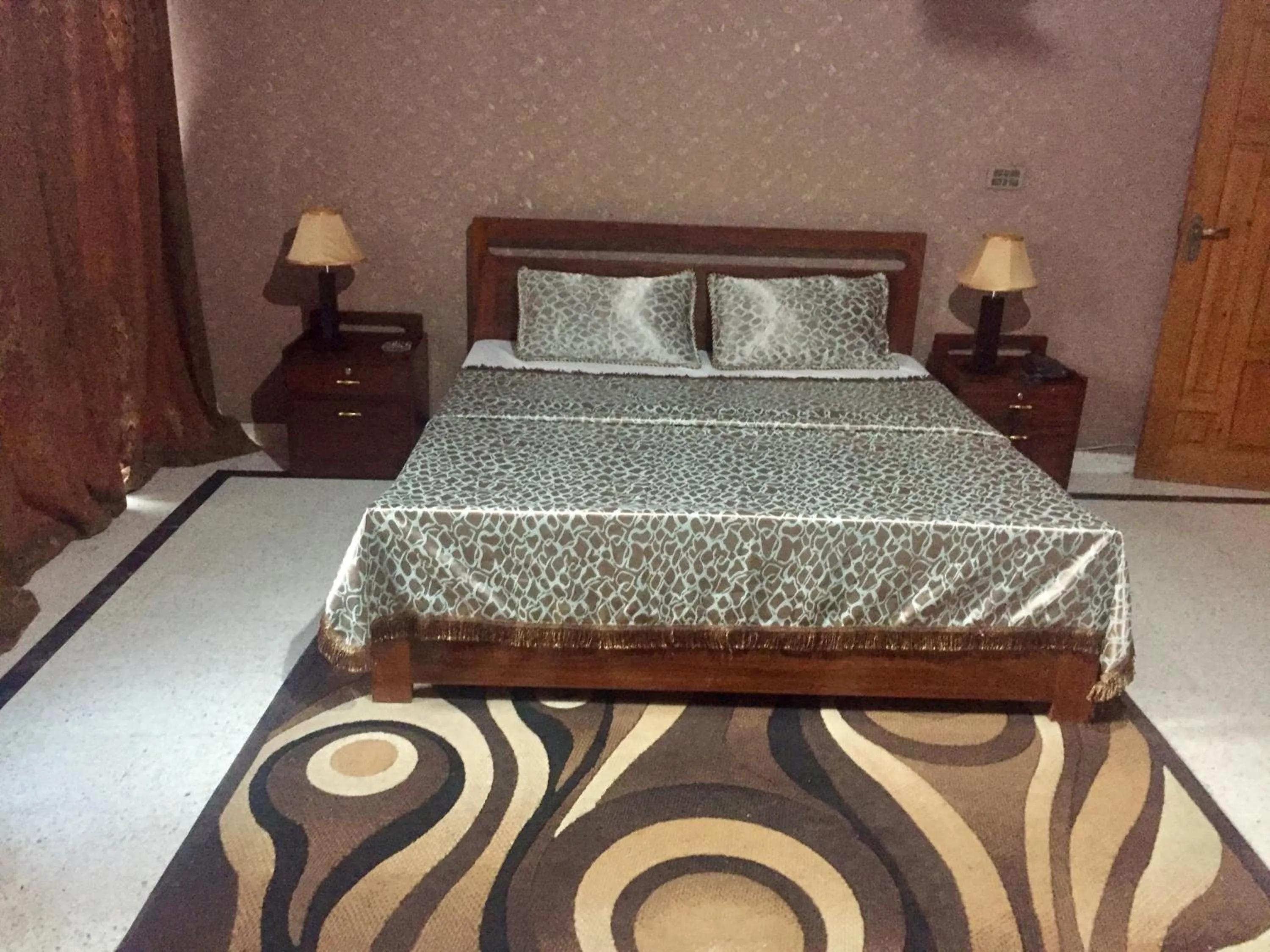 Bed in Muzaffarabad View Motel