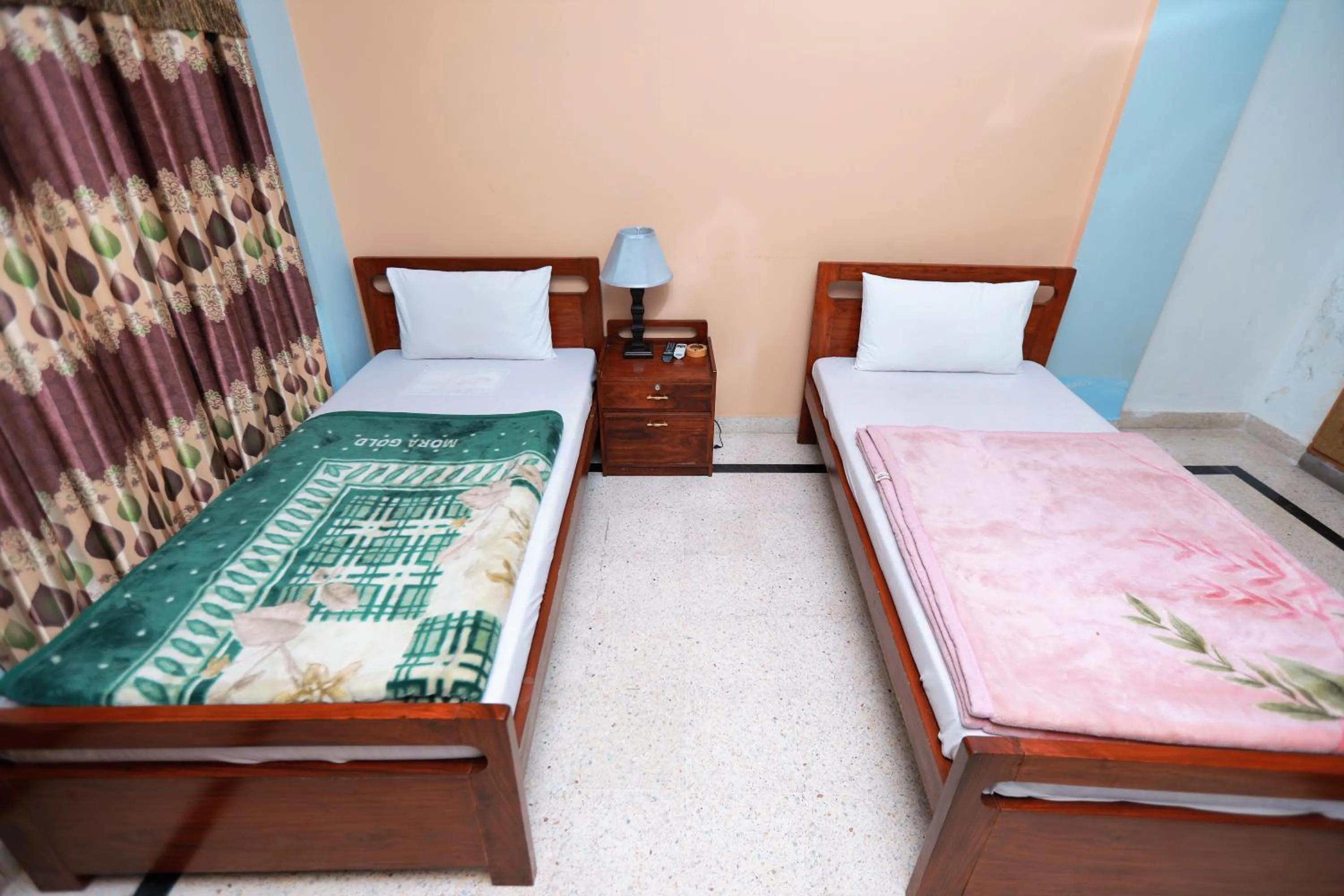 Bed in Muzaffarabad View Motel