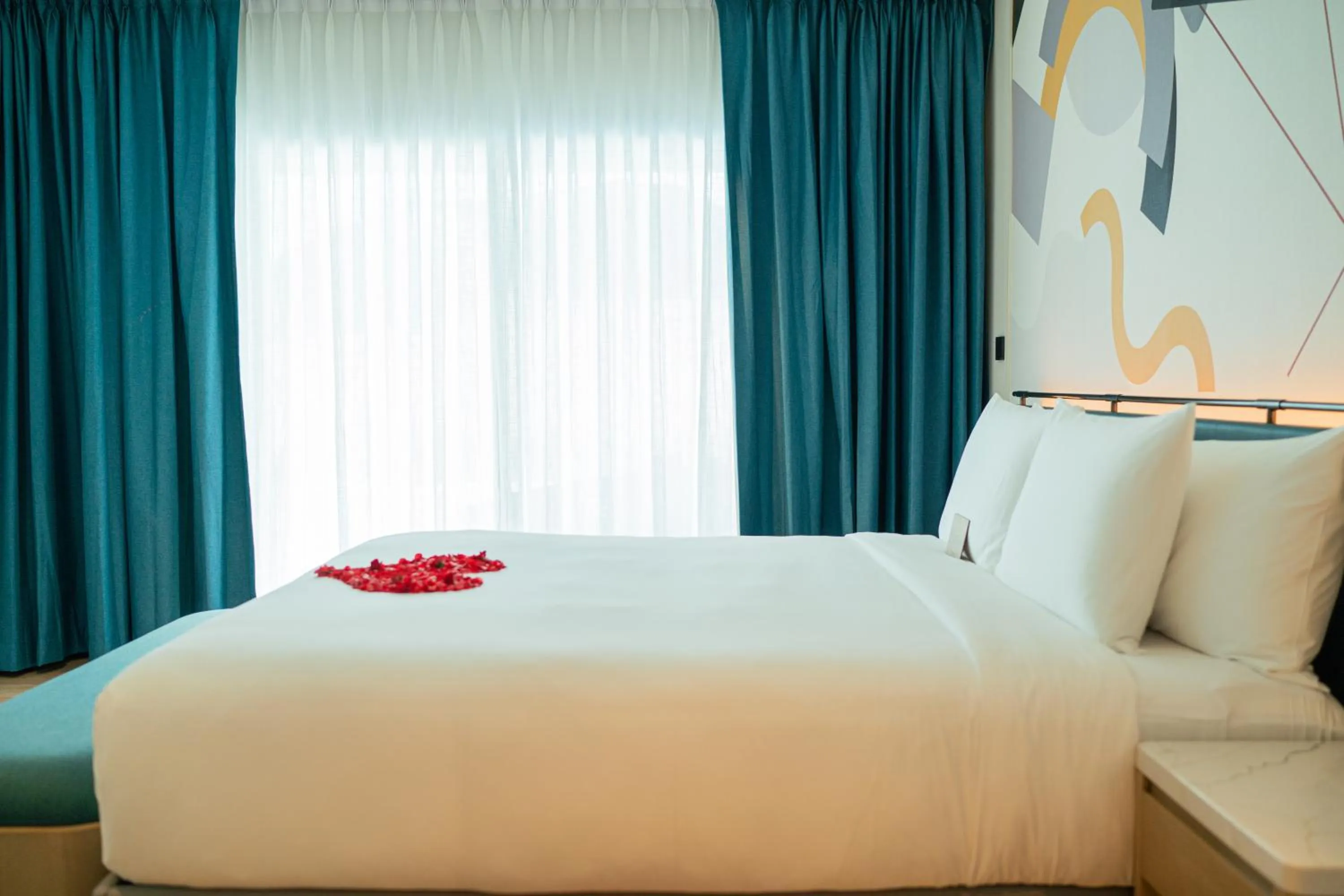 Bed in M Social Hotel Phuket