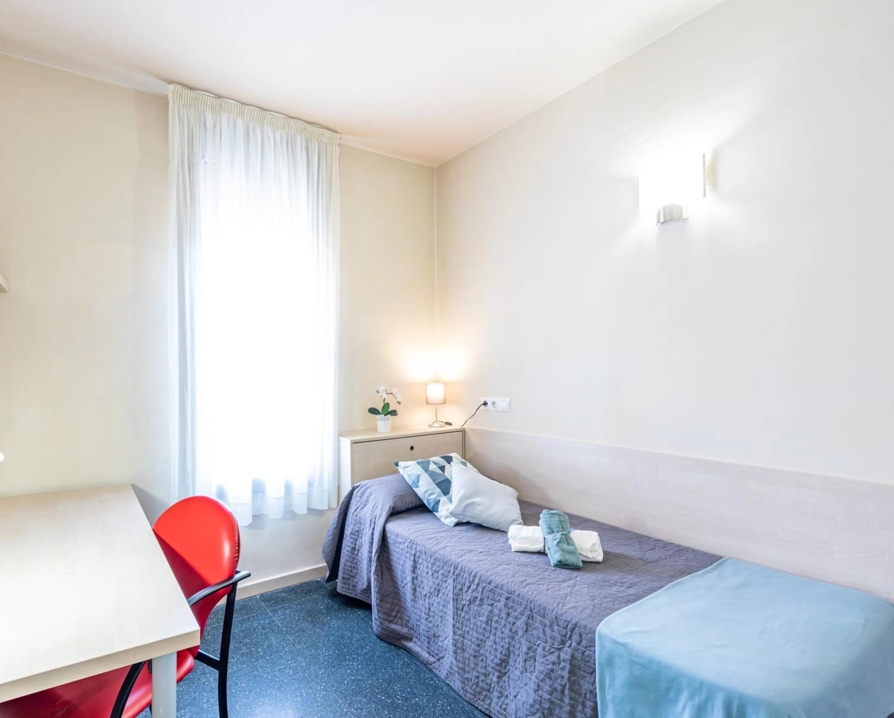 Bed in Residencia Universitaria Resa Giner de Los Ríos