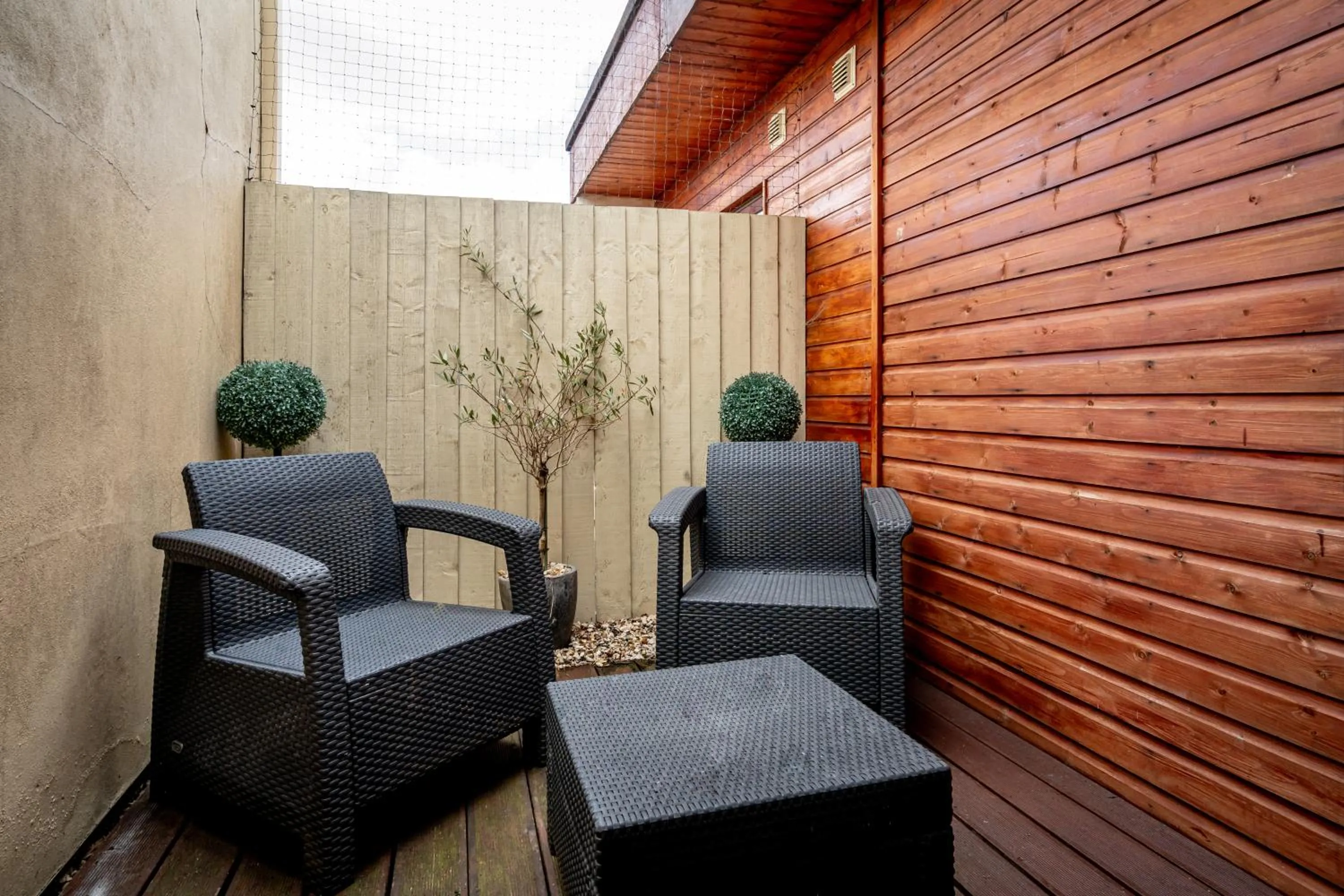 Seating area in Strozzi Palace Suites by Mansley