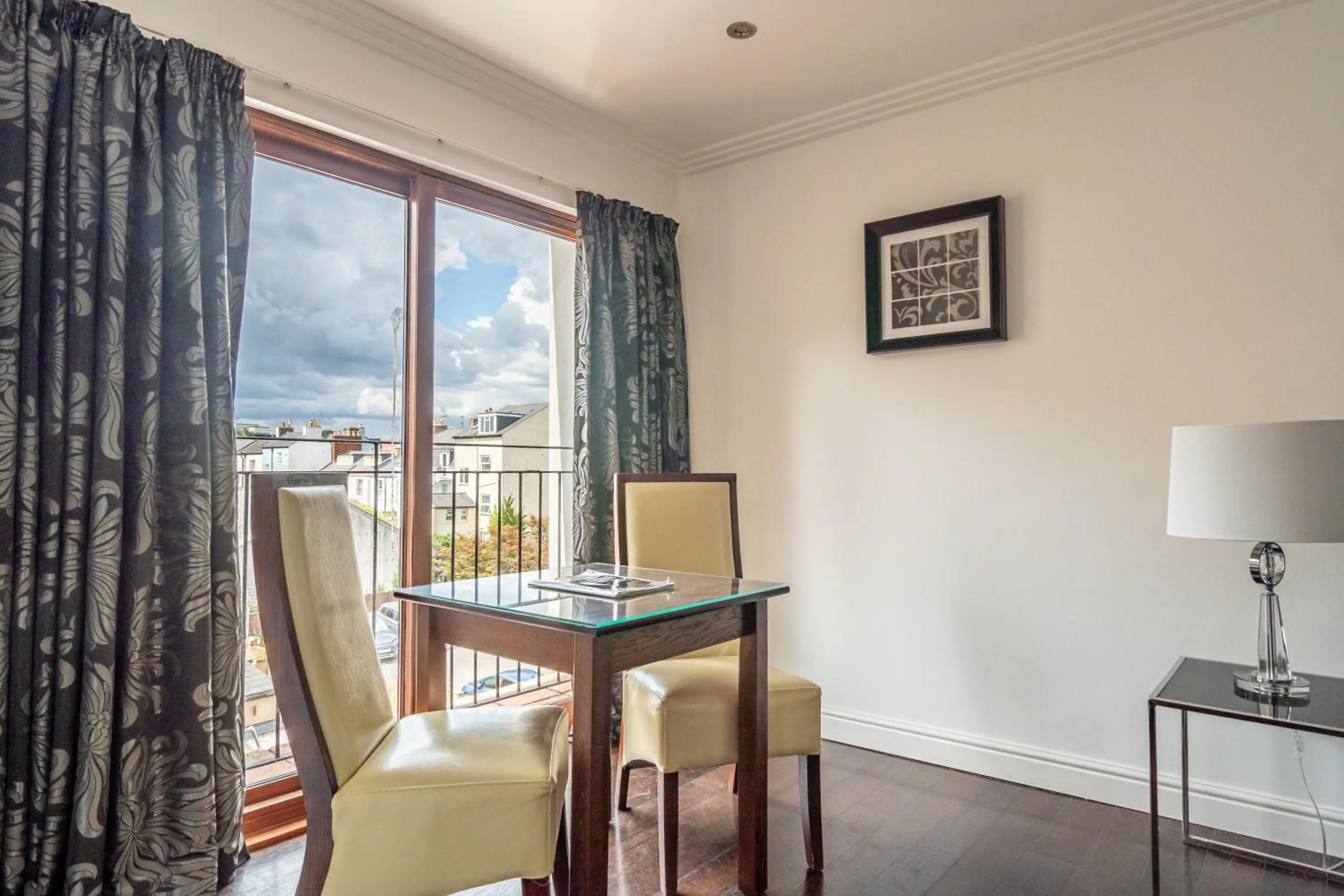 Seating area in Strozzi Palace Suites by Mansley