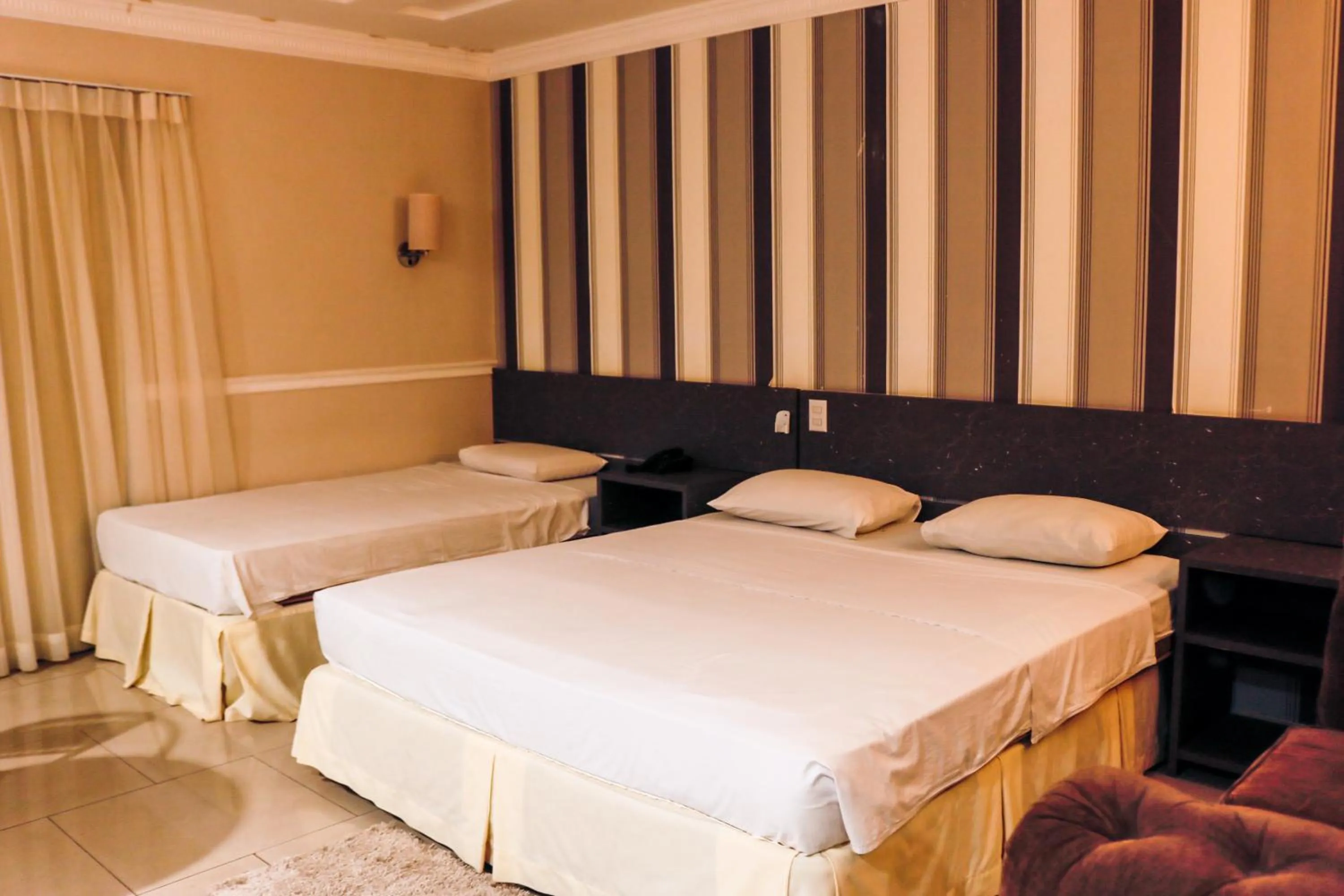 Bed in Atalanta Hotel