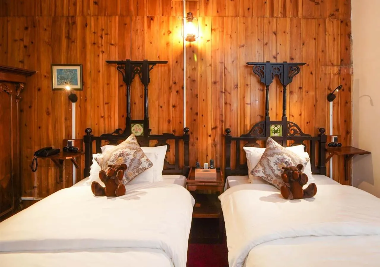 Bed in Cochrane Place Hotel