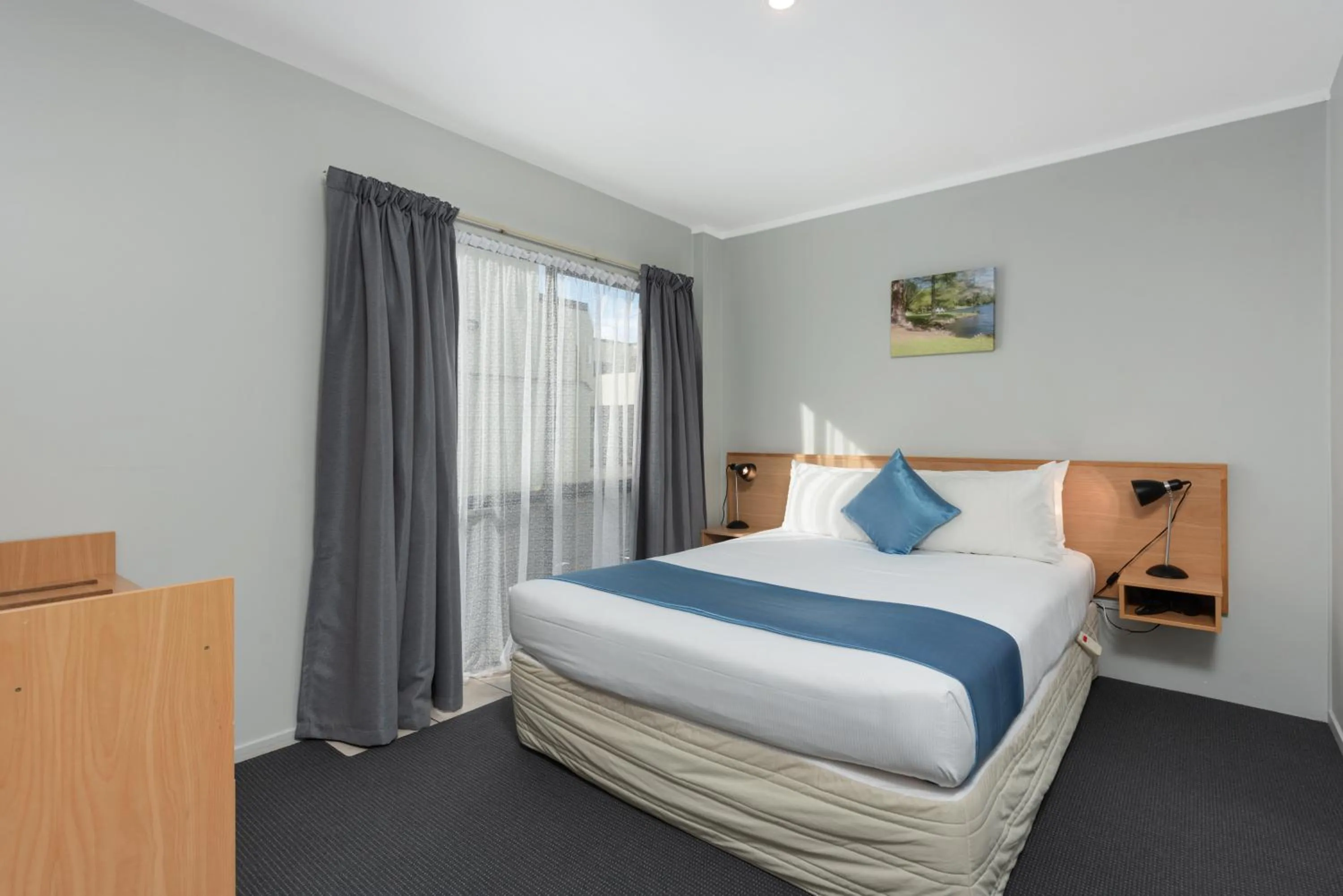 Bed in ASURE Macy's Motor Inn