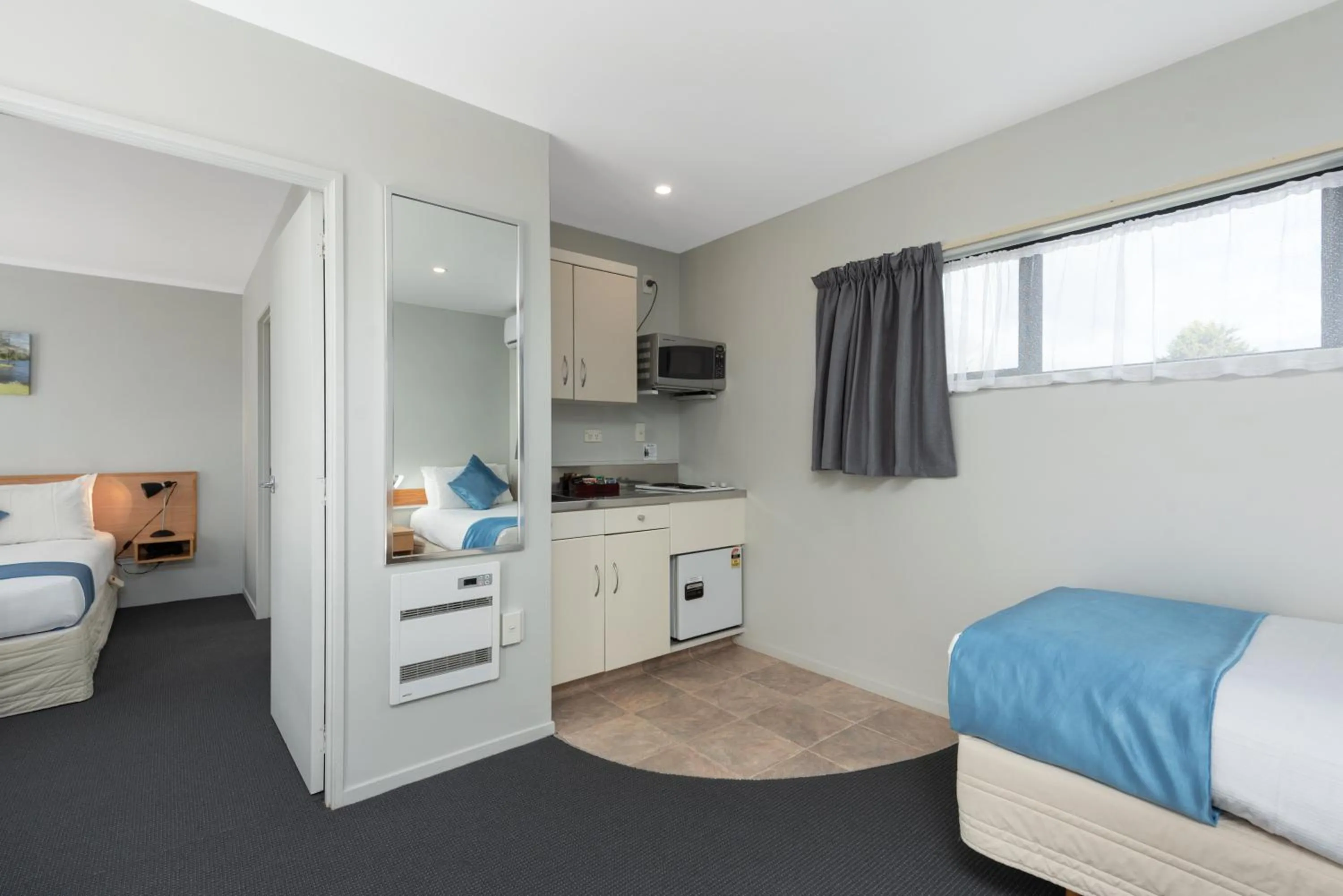 Bed in ASURE Macy's Motor Inn