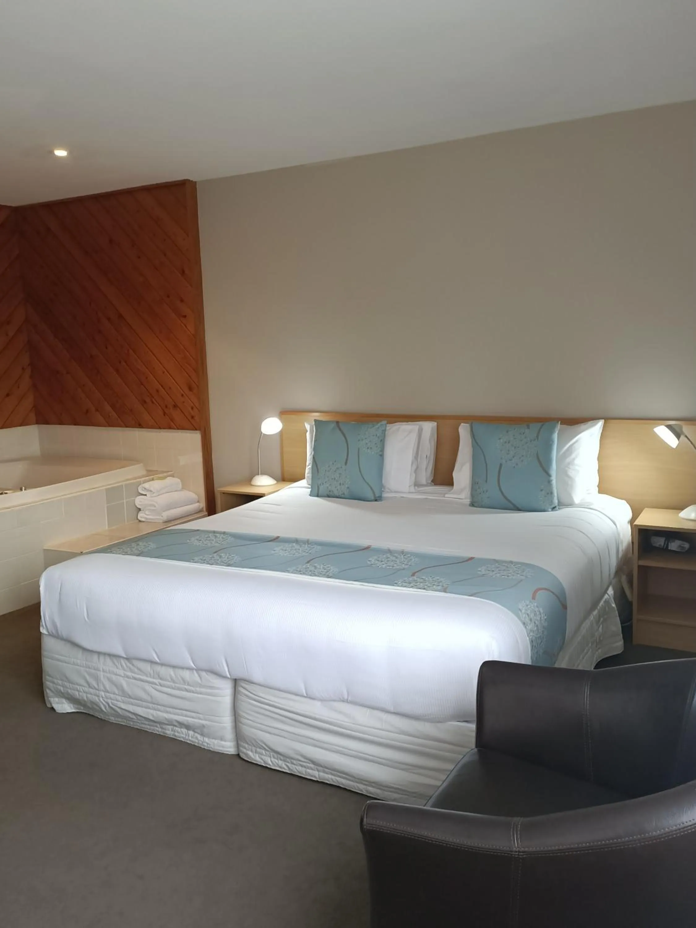 Bed in ASURE Macy's Motor Inn