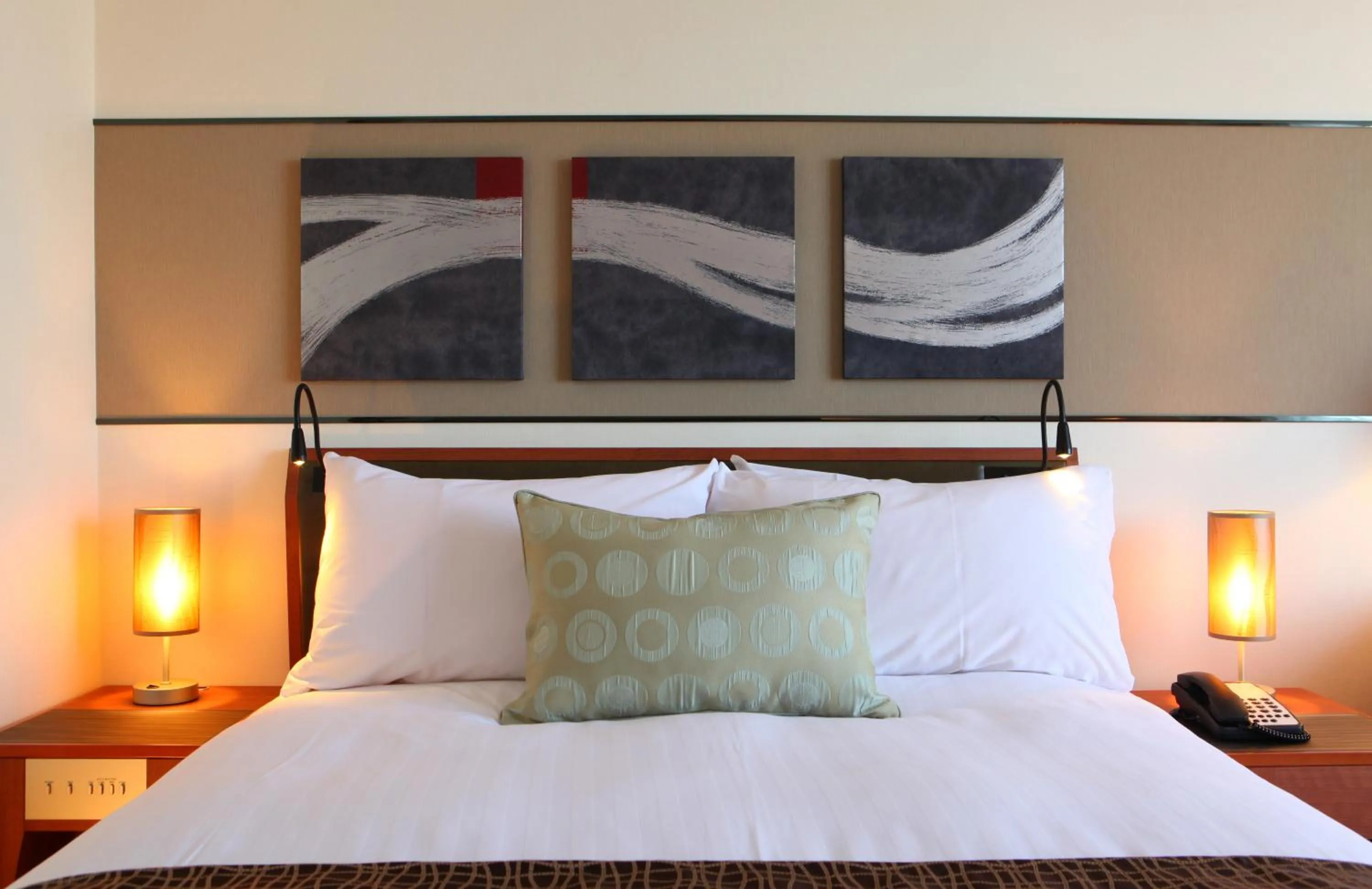 Bed in International Resort Hotel Yurakujo