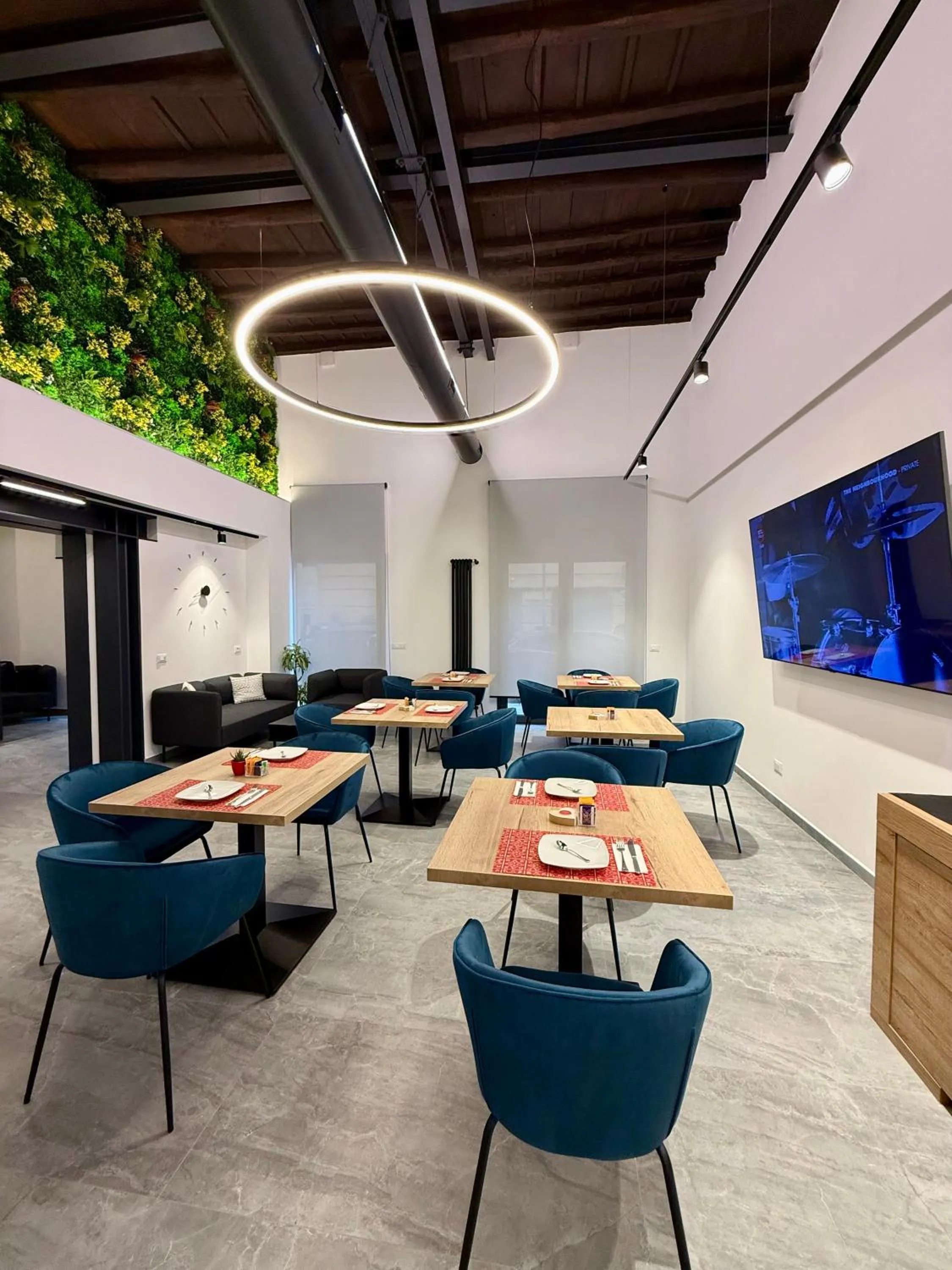 Communal lounge/ TV room in Le Quattro Stagioni - Rooms & Suites