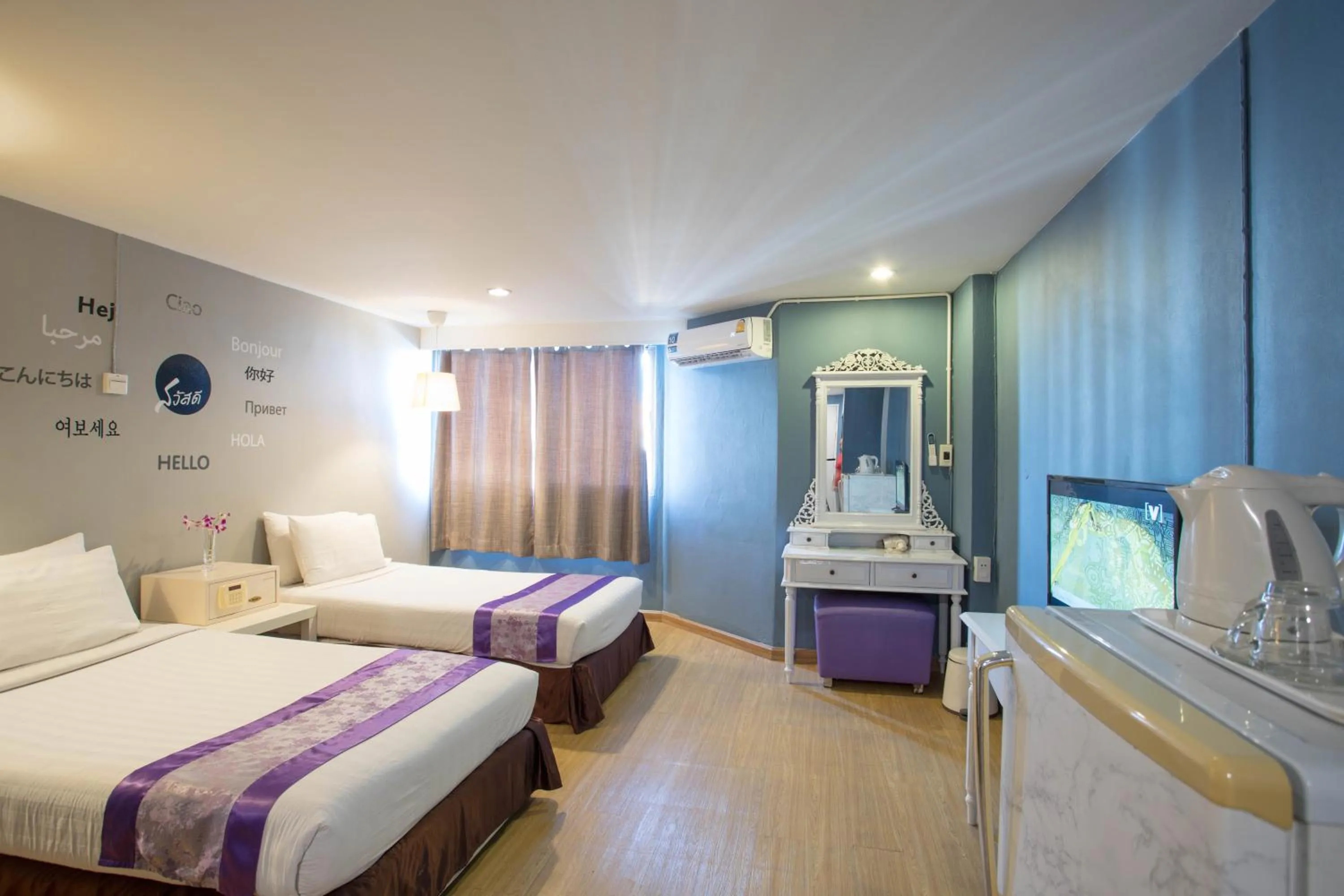 Bed in Sawasdee Siam Pattaya Hotel