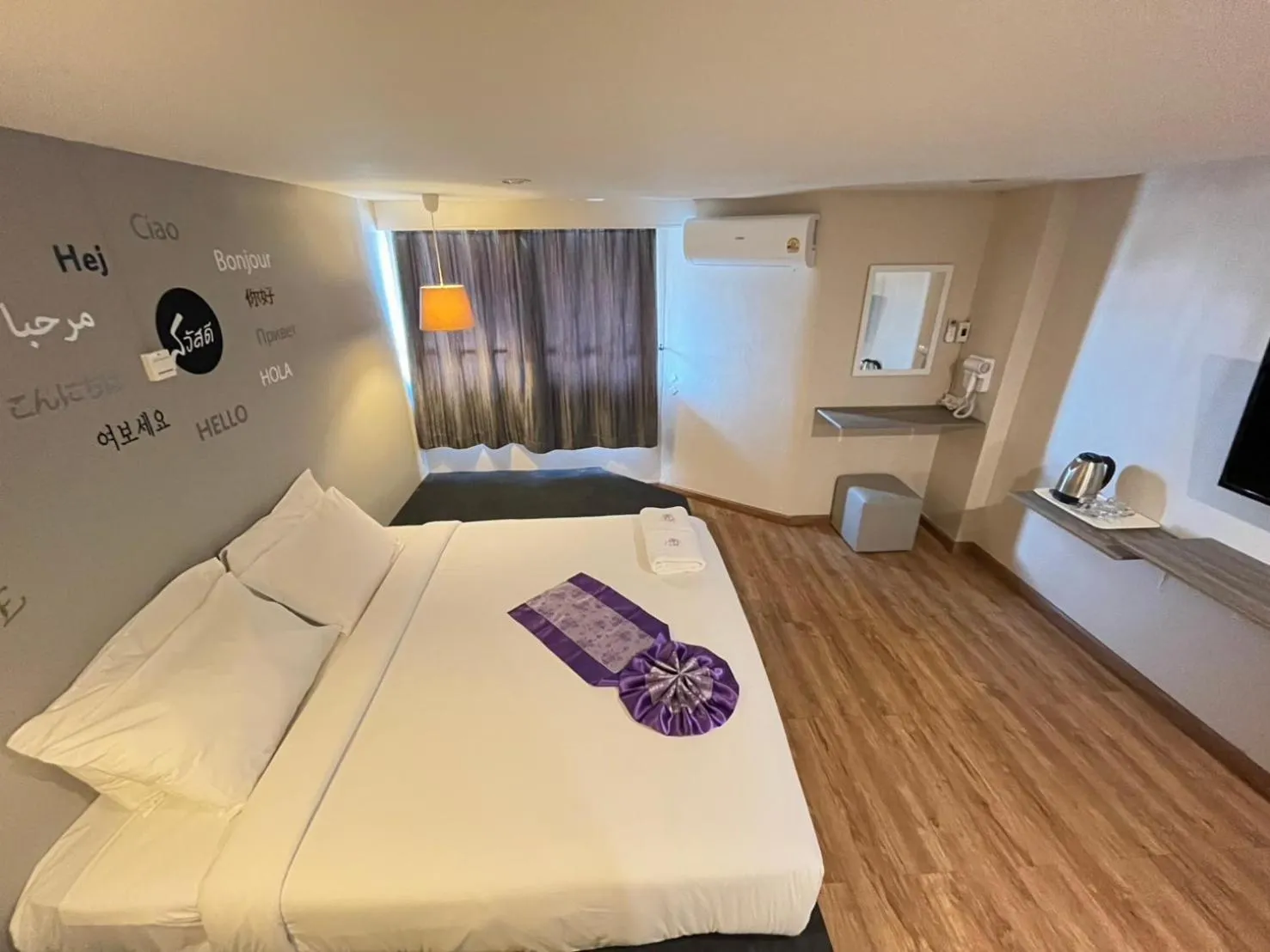 Bed in Sawasdee Siam Pattaya Hotel