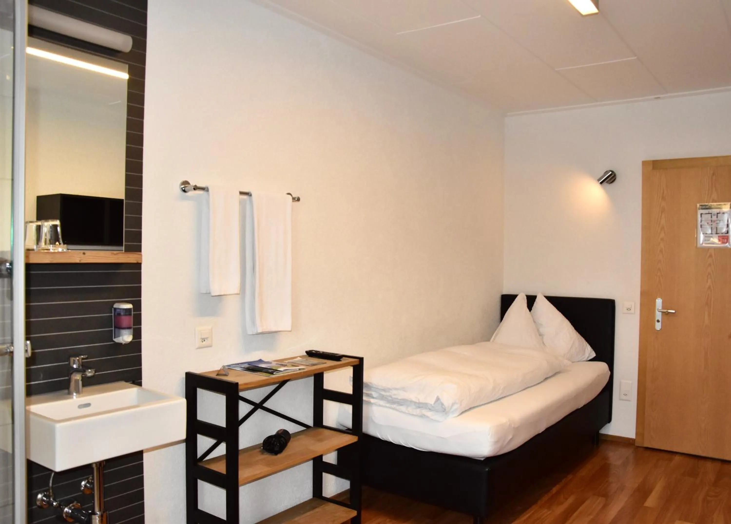 Photo of the whole room, Bed in Hotel Rätia