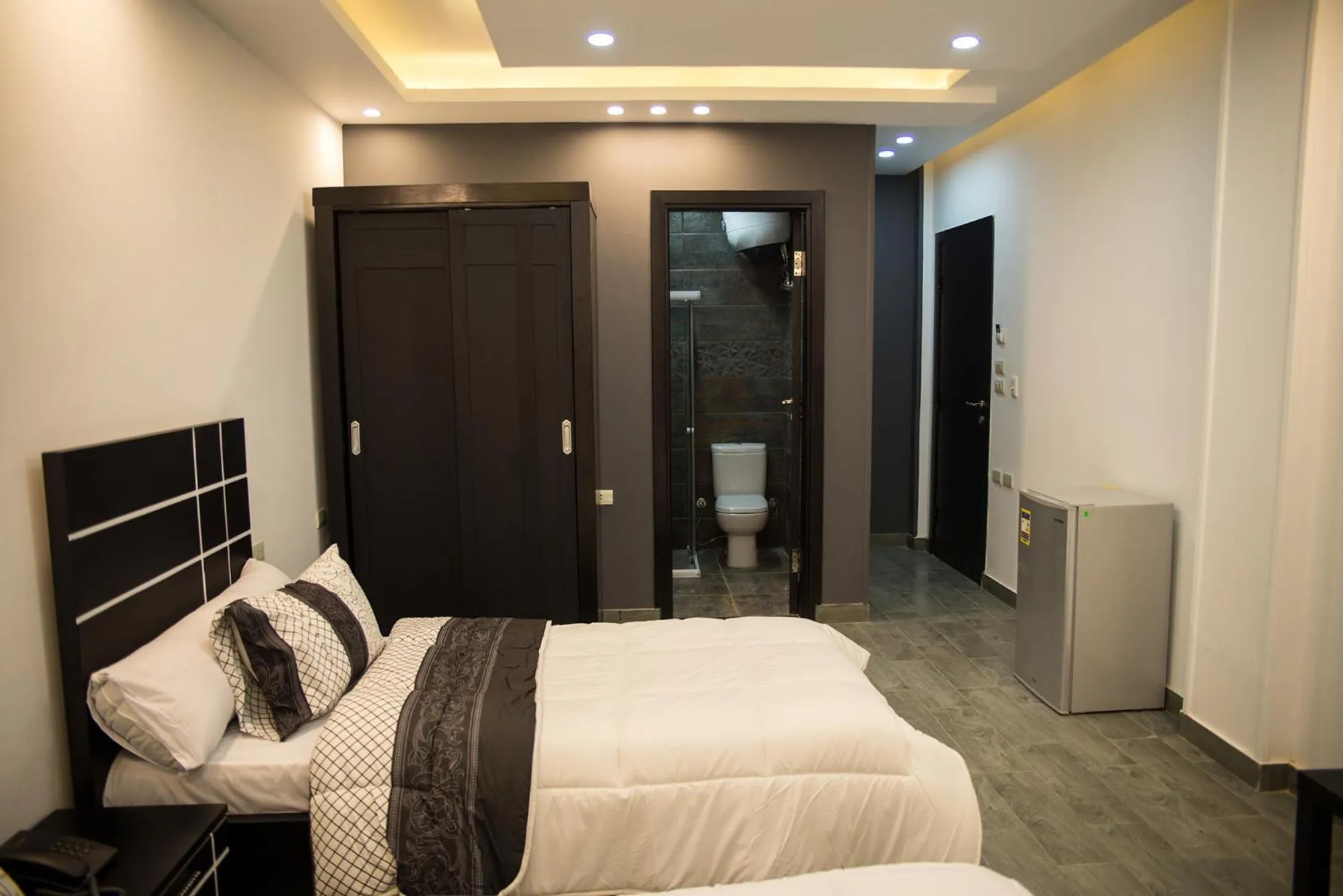 Toilet, Bed in Marvel Stone Hotel