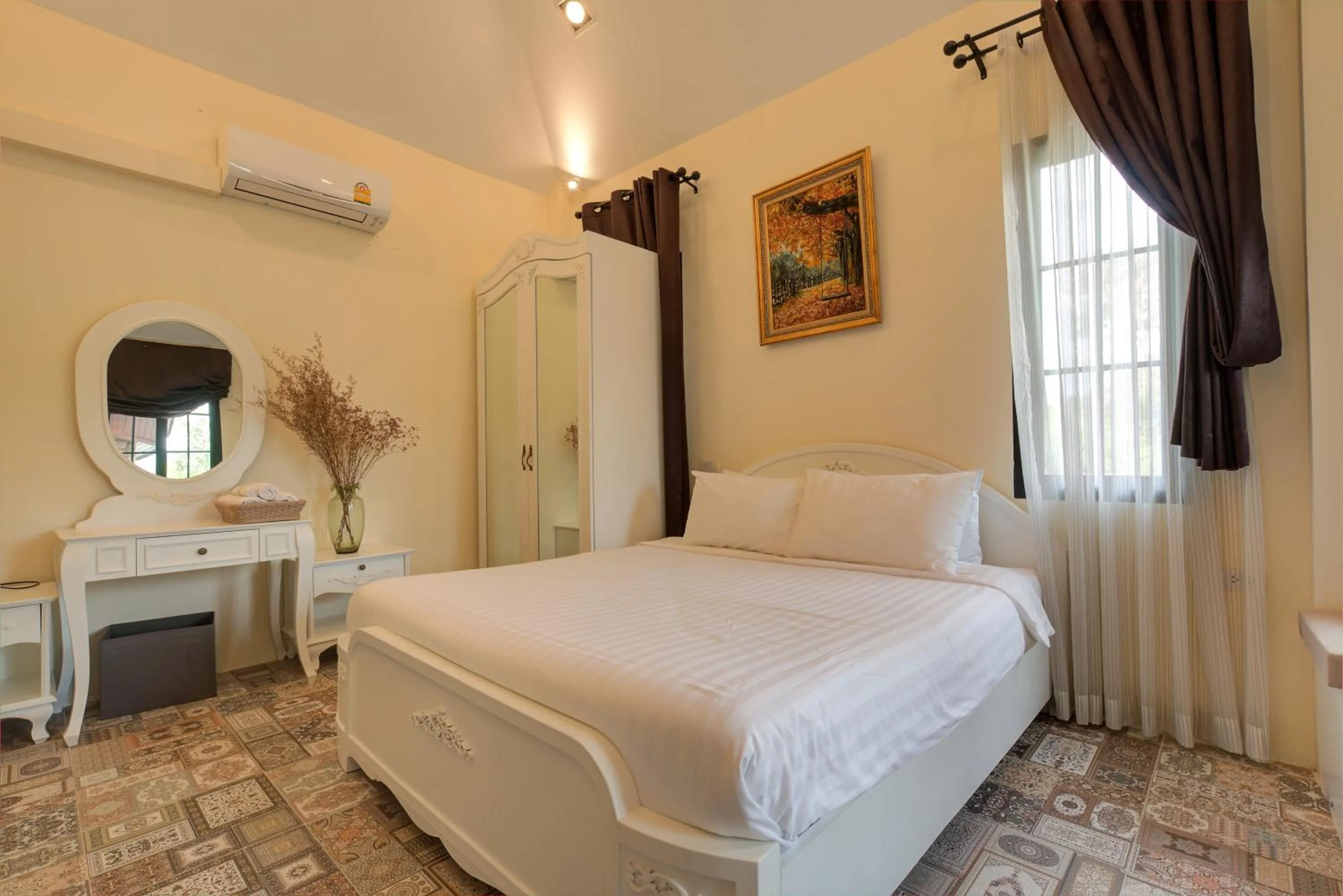 Bed in Chateau de Prim Khao Yai