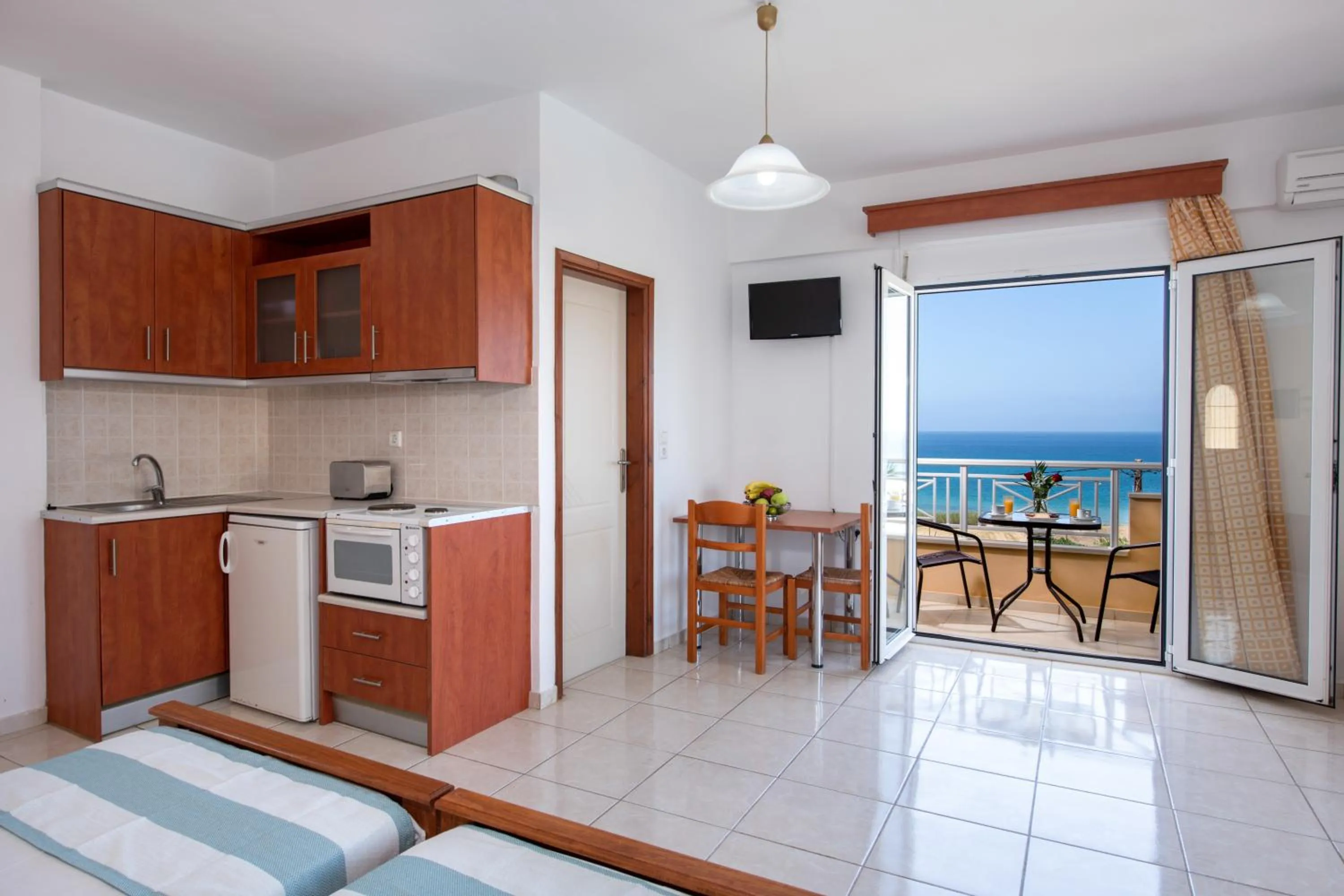 Bed in Sunrise Apartments