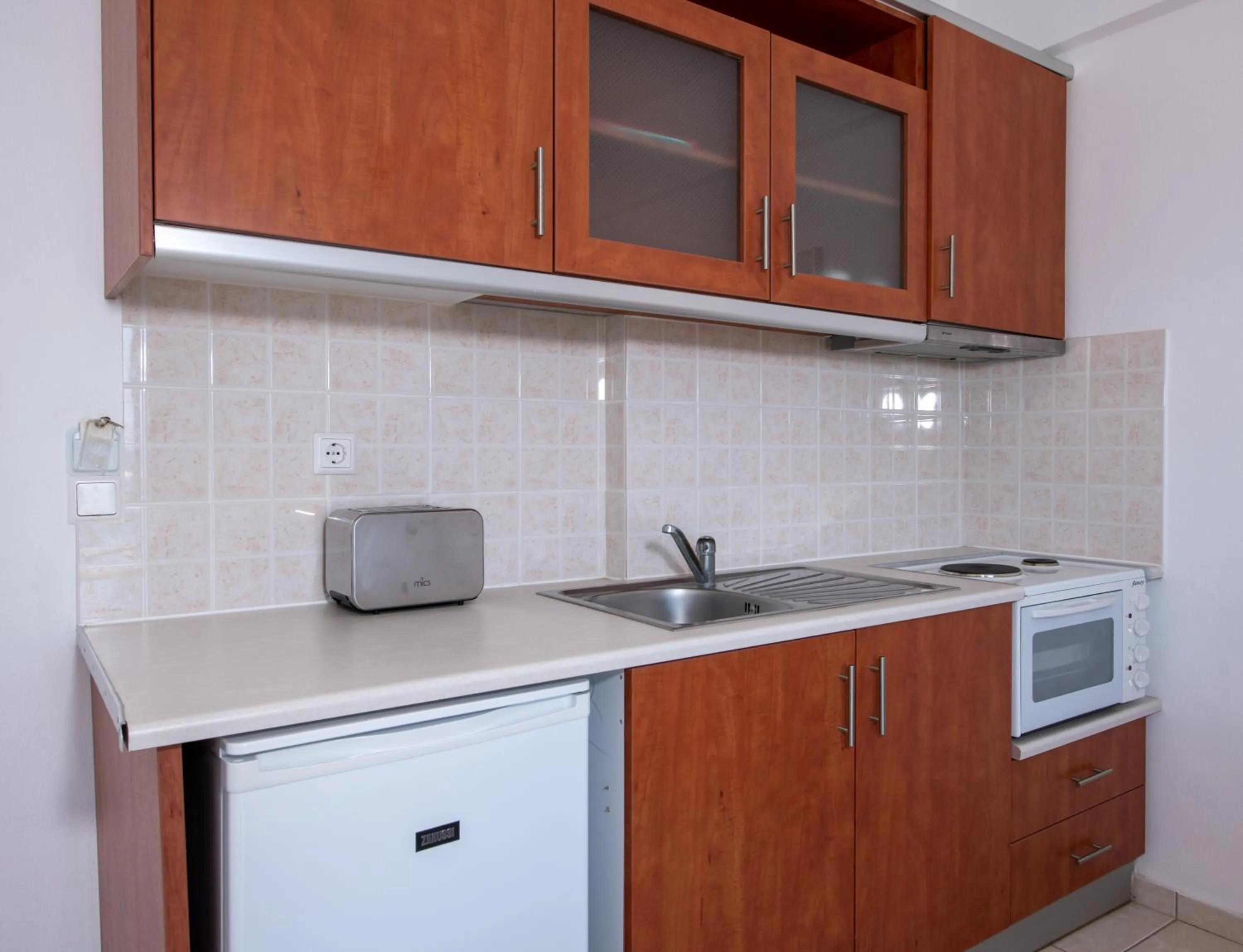 Kitchen or kitchenette in Sunrise Apartments