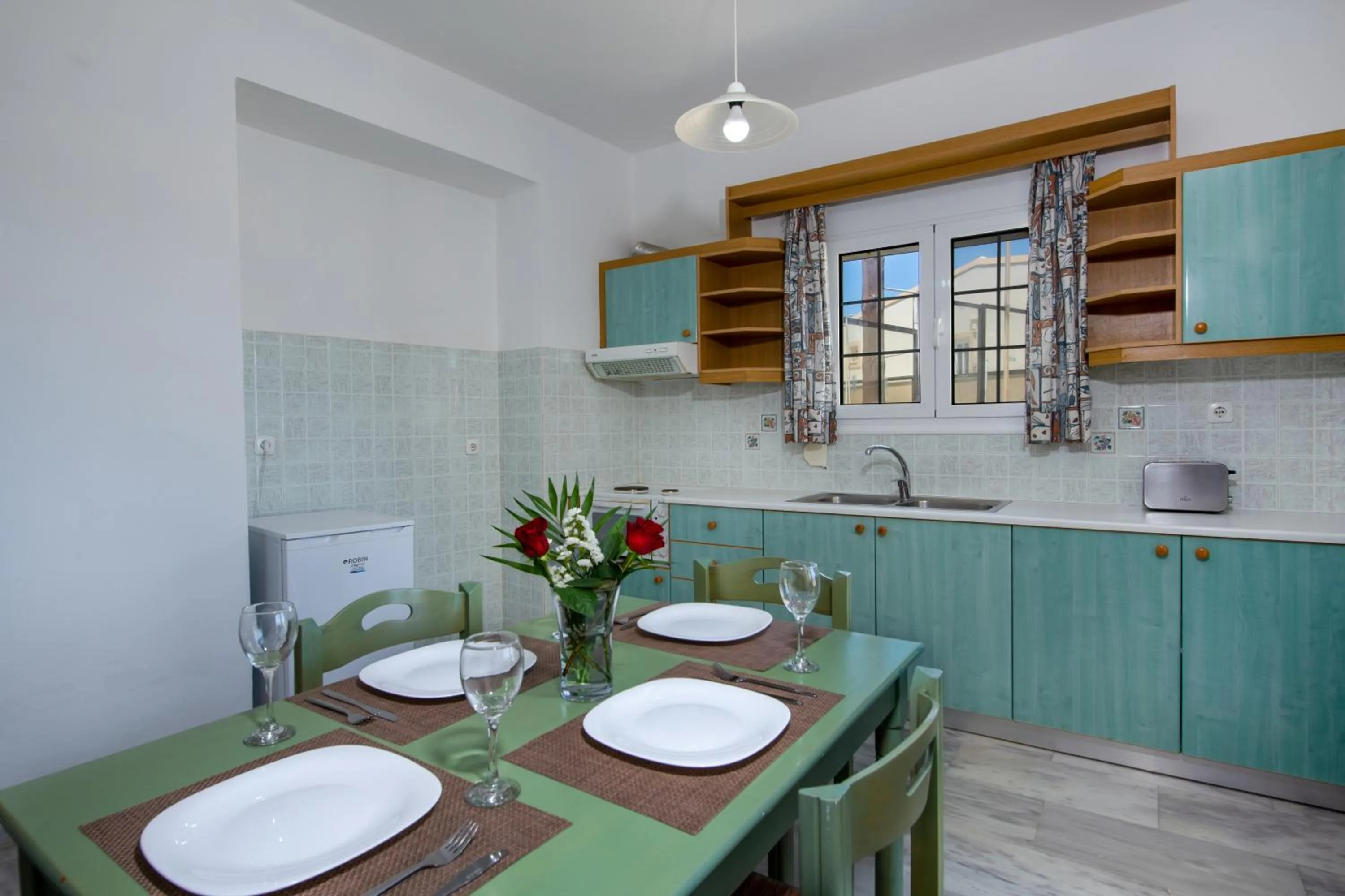 Kitchen or kitchenette in Sunrise Apartments