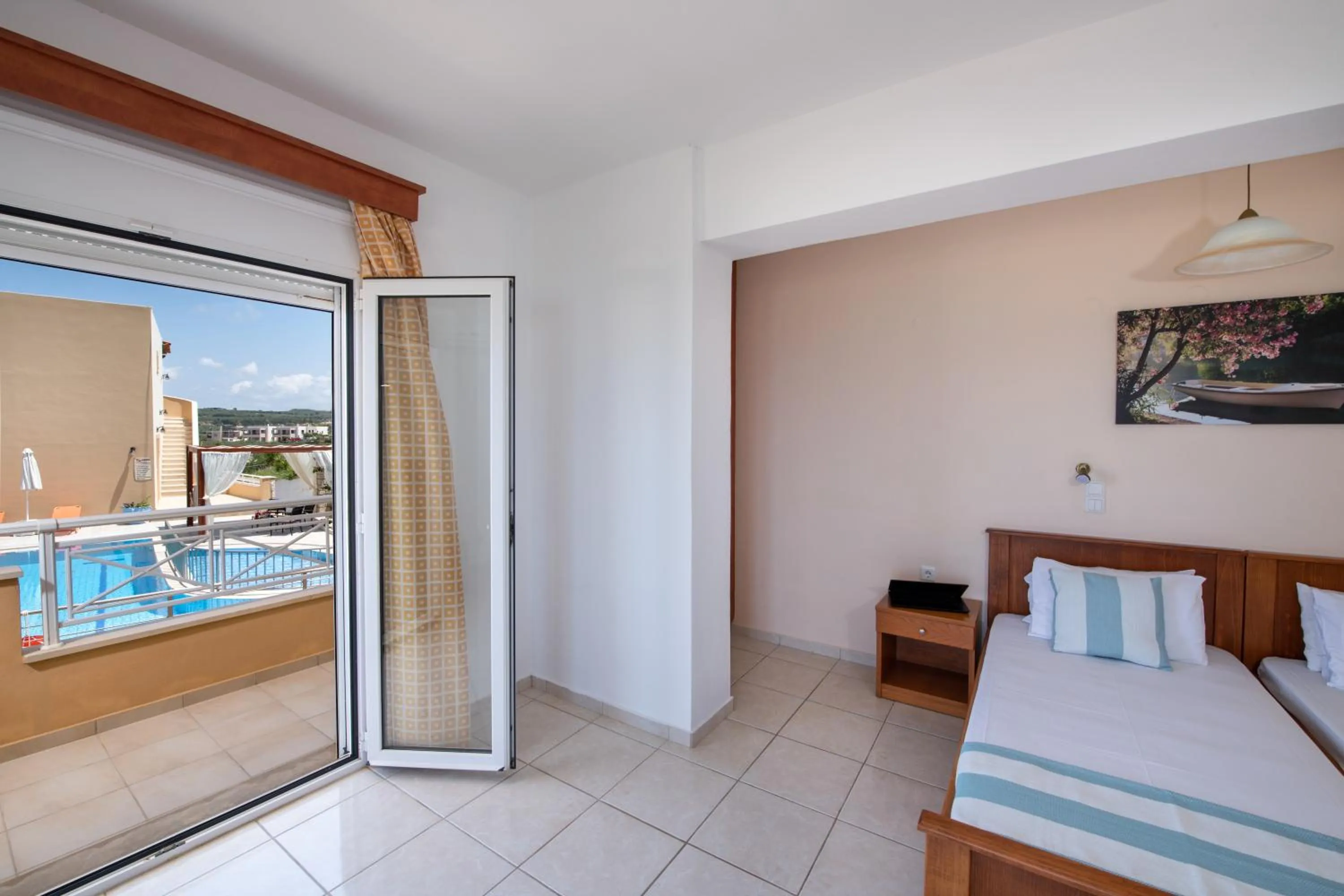 Bed in Sunrise Apartments