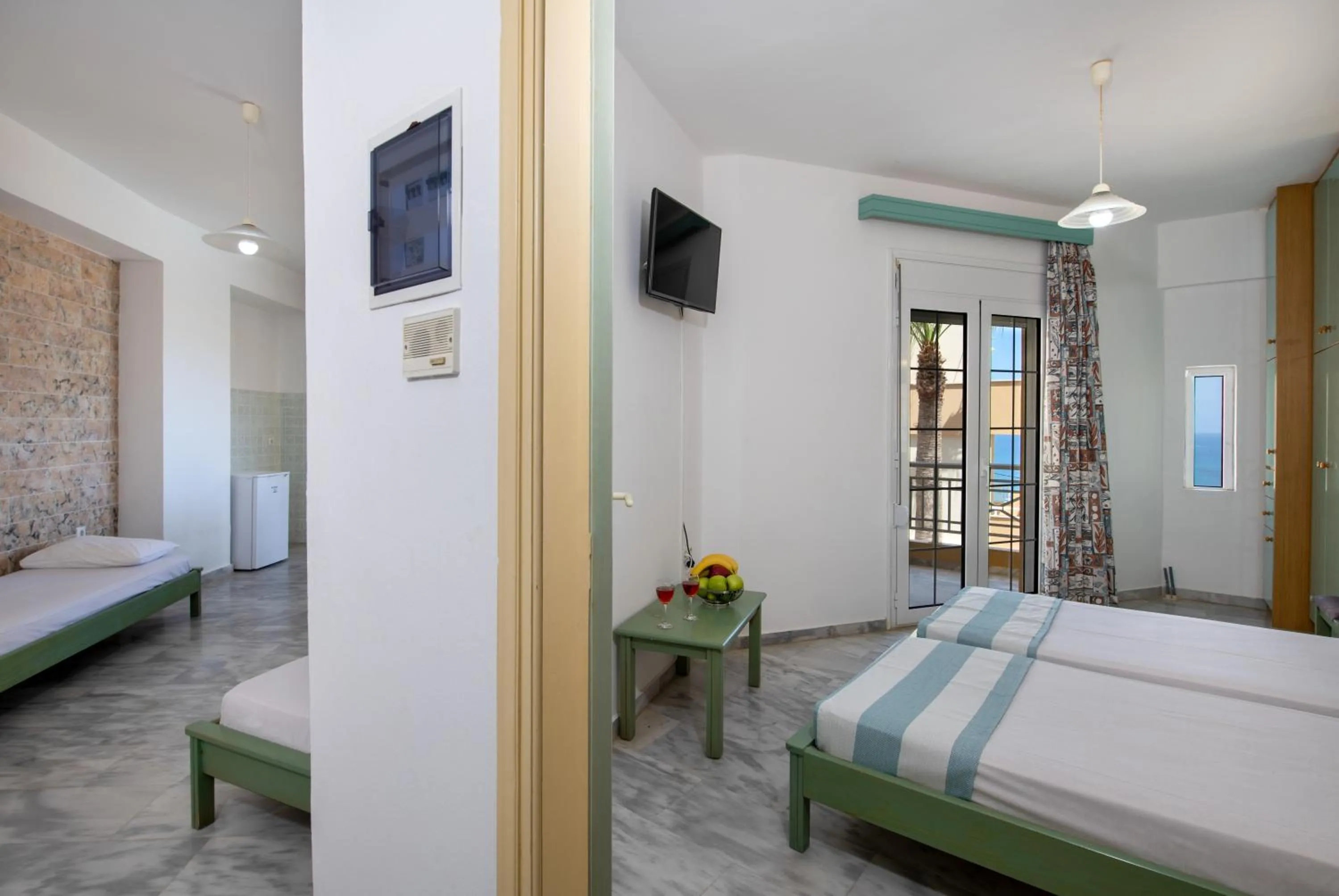 Bed in Sunrise Apartments