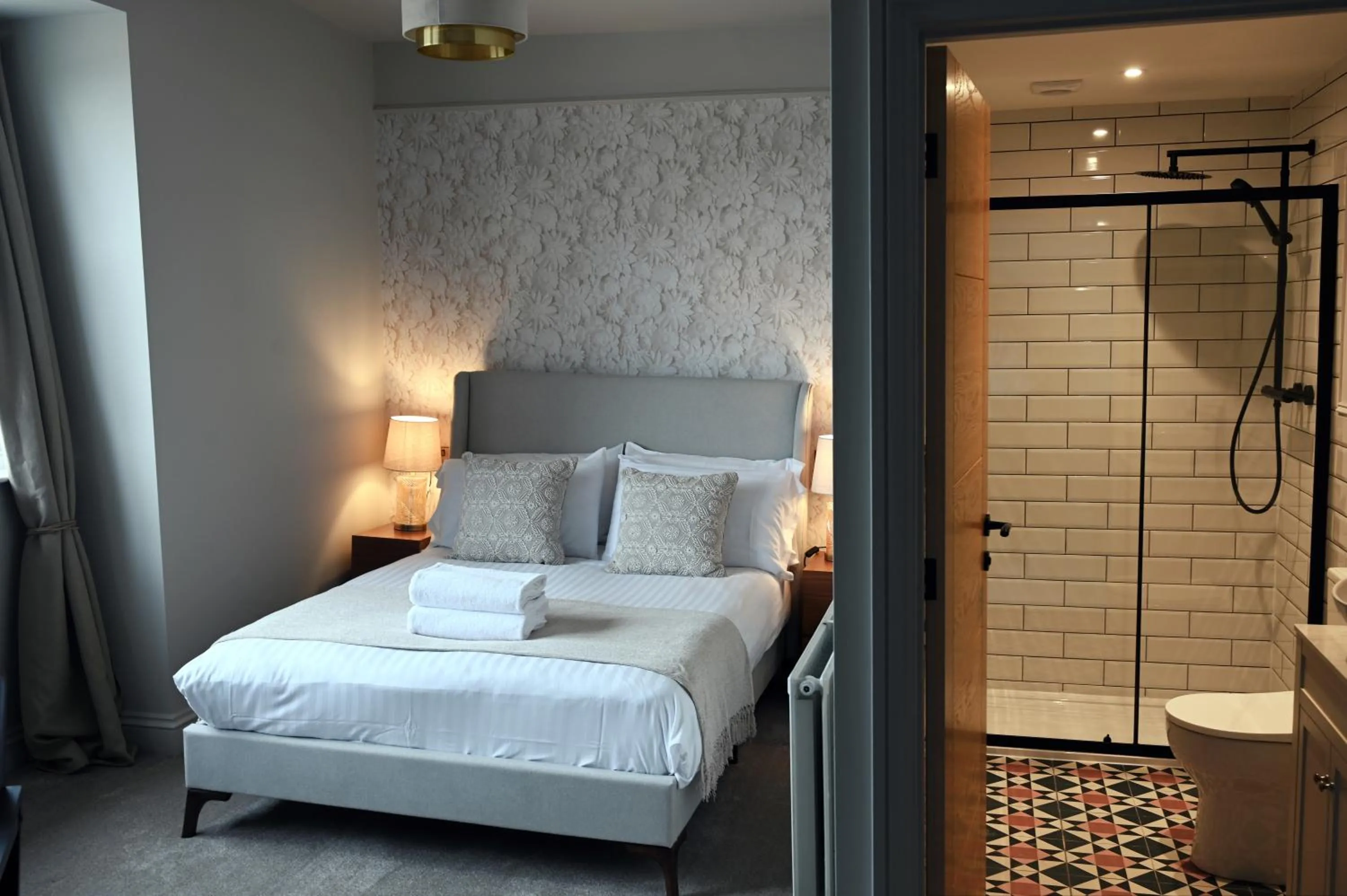 Bed in Royal Lion Hotel