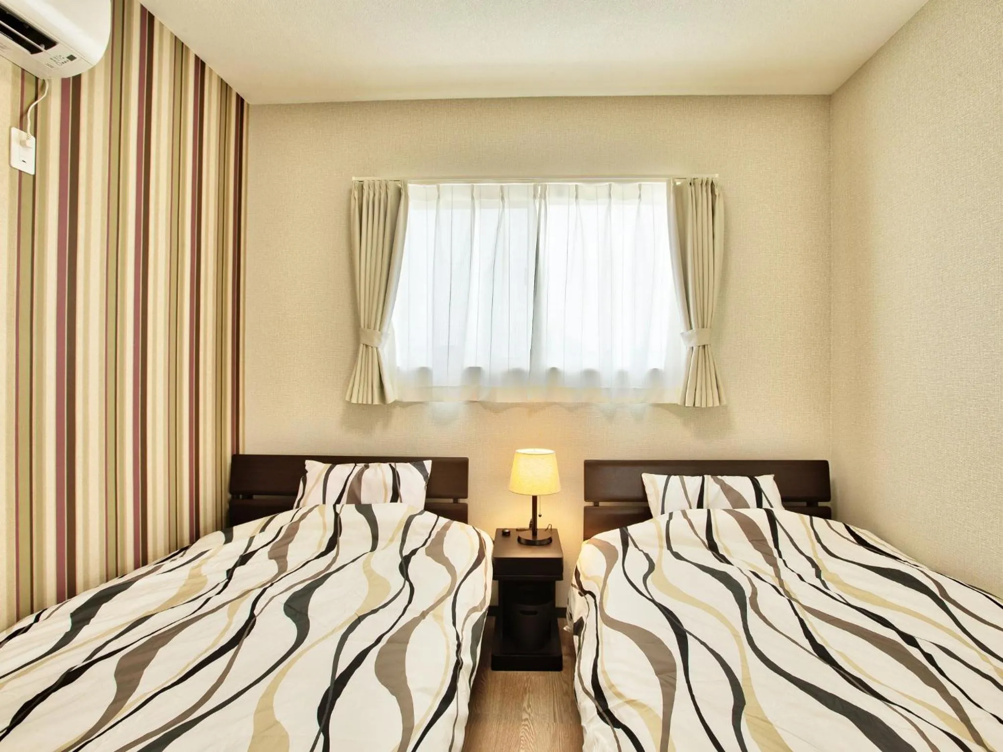 Bedroom, Bed in Cottage Sea Wind Nakijin