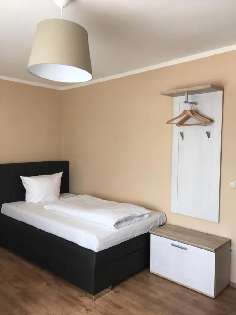 Bed in Hotel-Residenz Oberurseler Hof