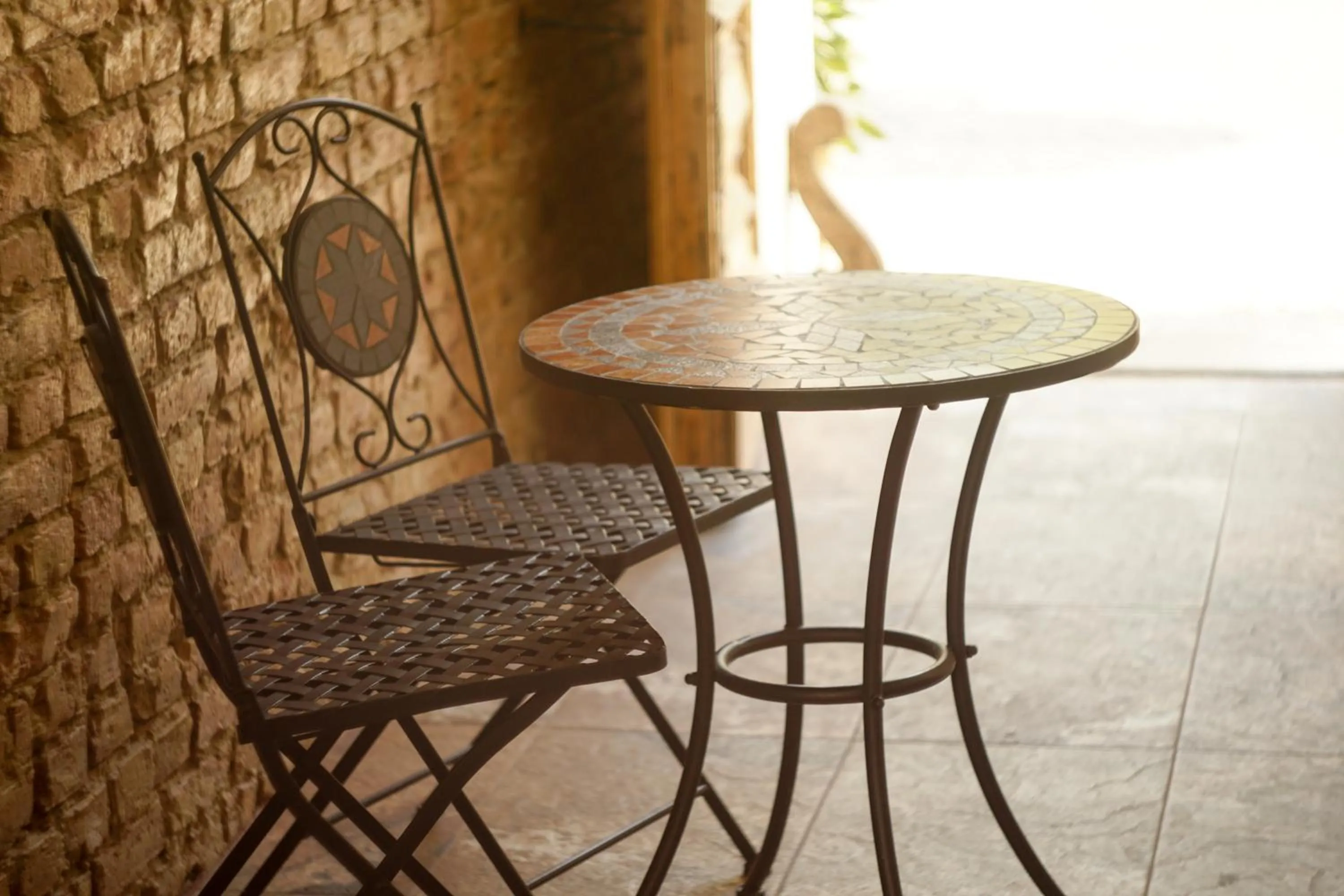 Patio in Hotel Bett und Buch