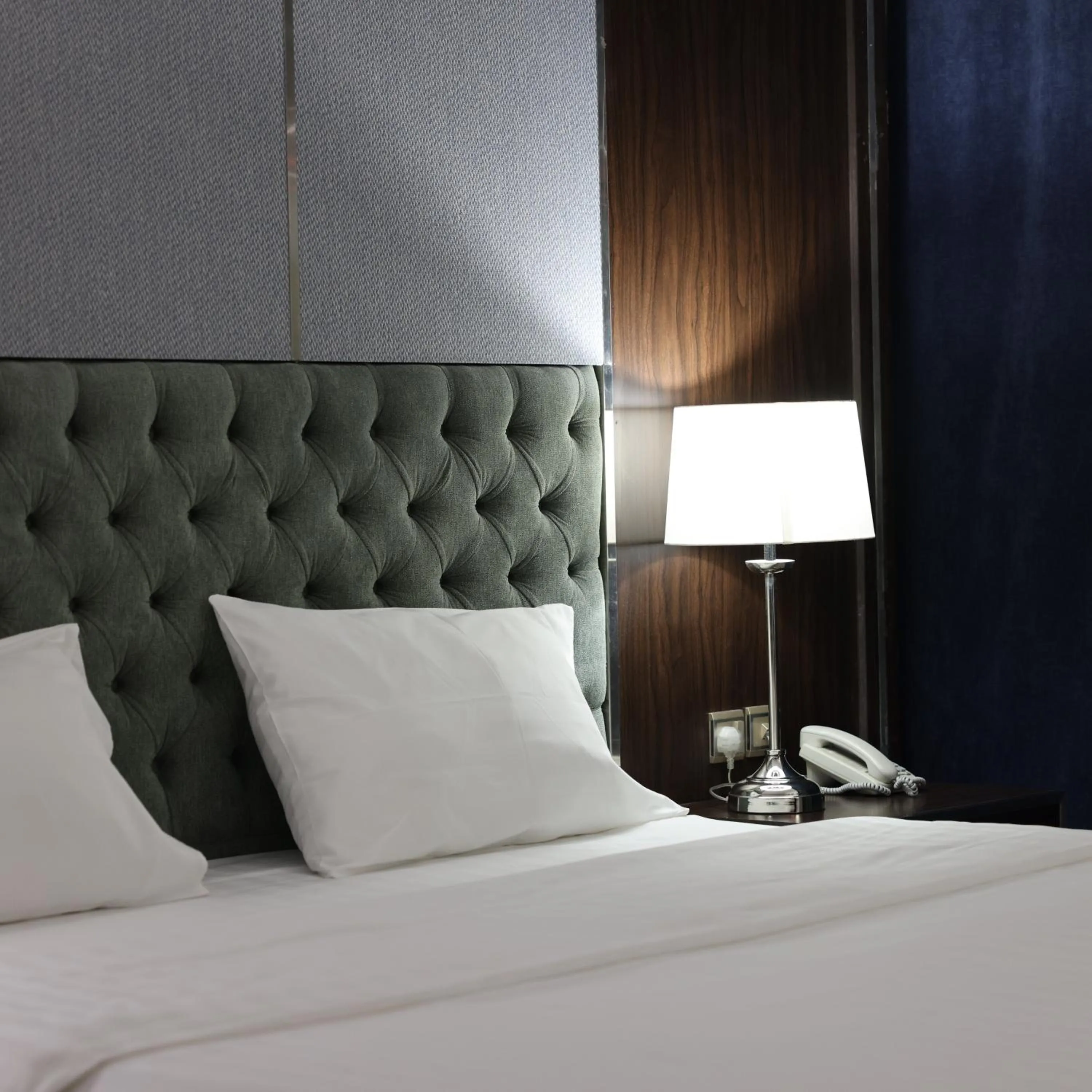 Bed in Lily Hotel Suite Mubarraz