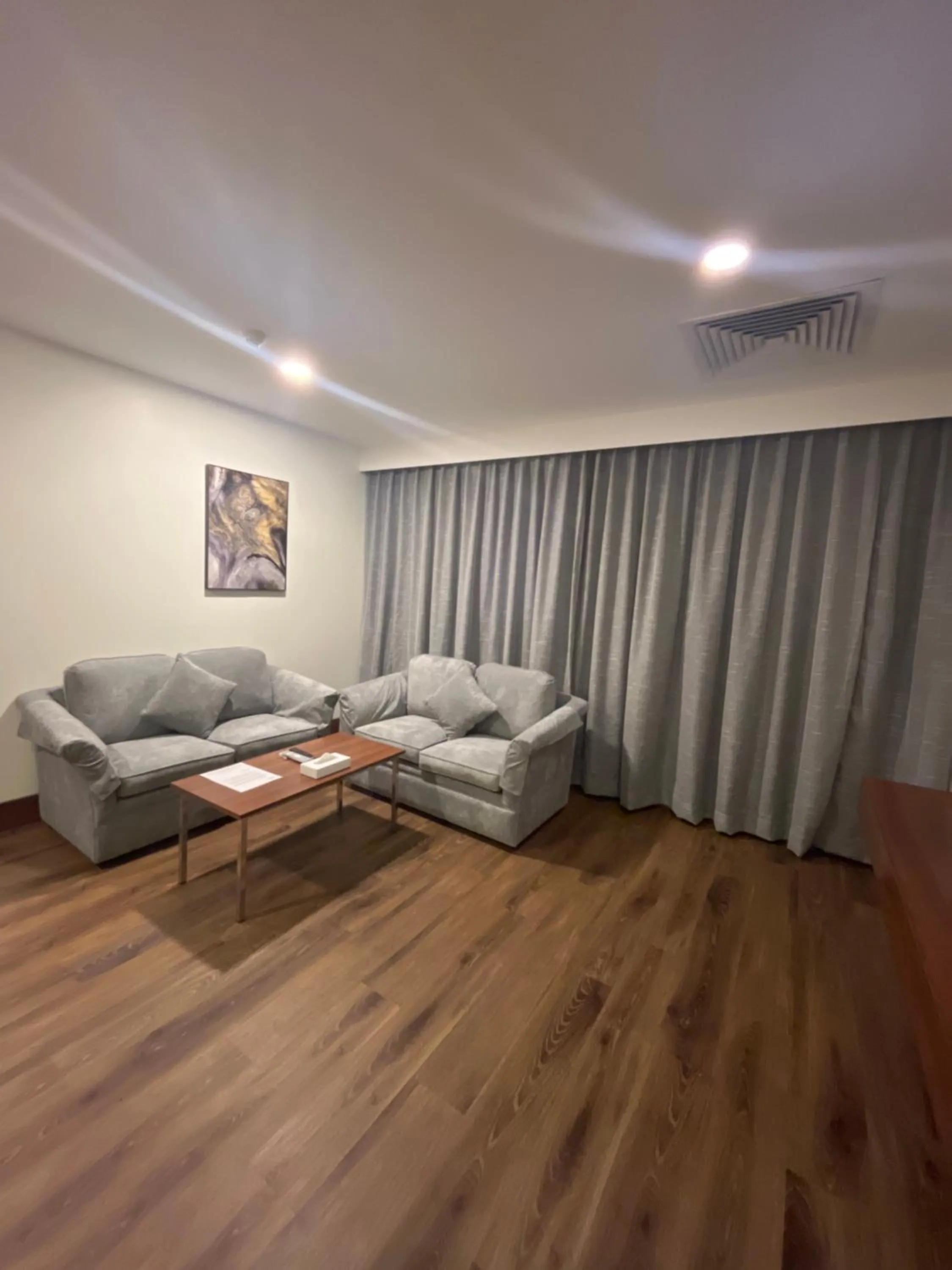 Living room in Lily Hotel Suite Mubarraz