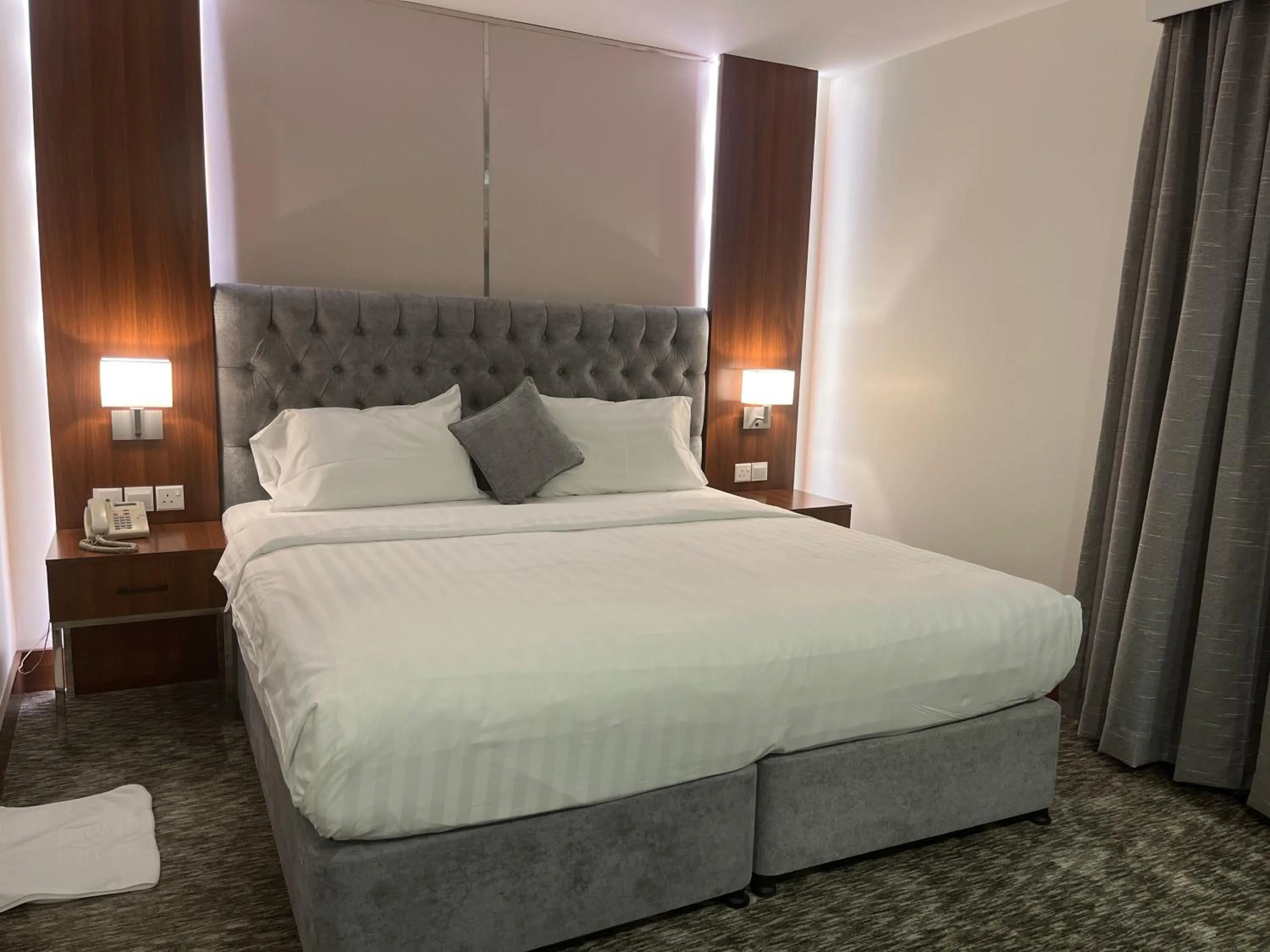 Bed in Lily Hotel Suite Mubarraz