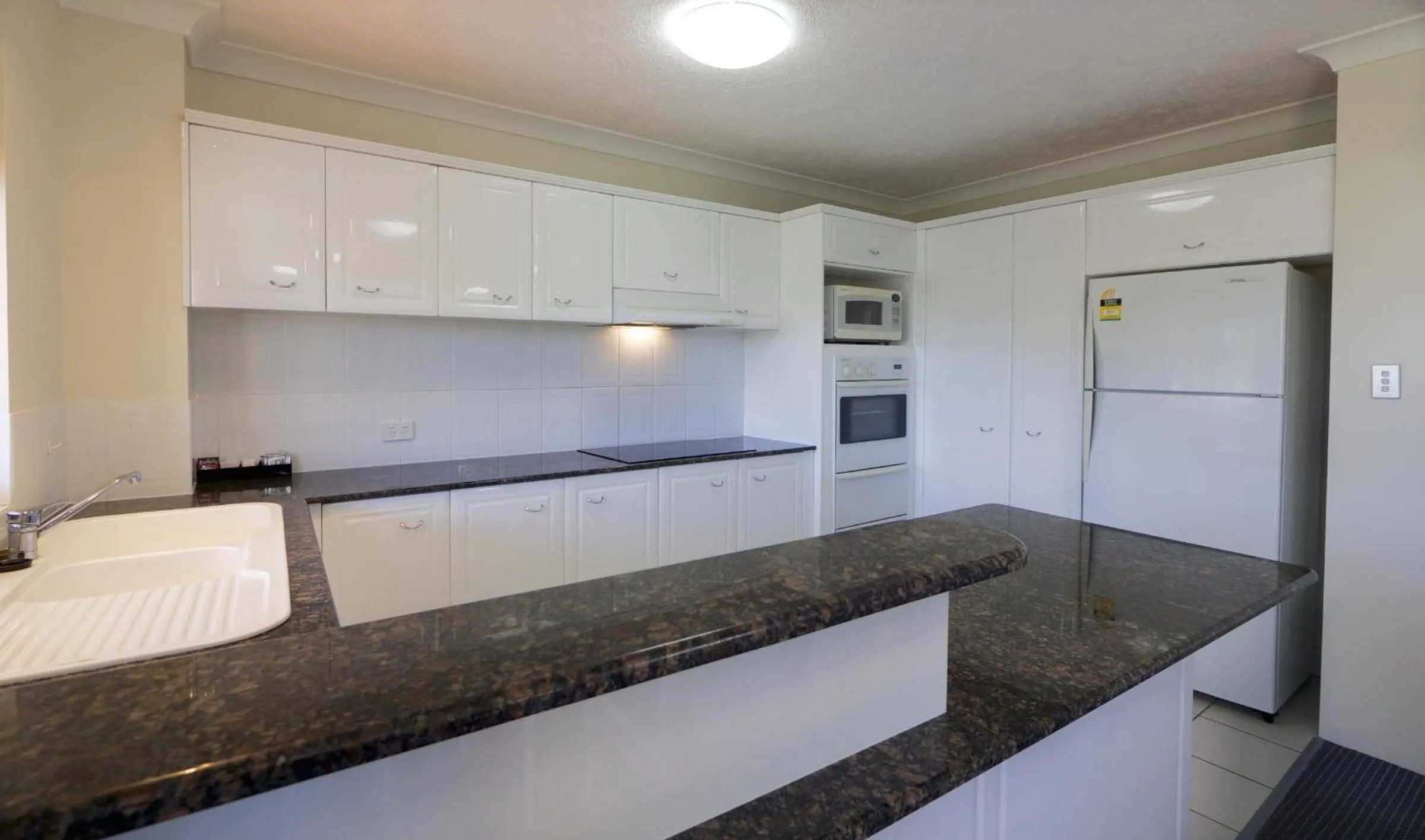 Kitchen or kitchenette in Pacific Place Apartments