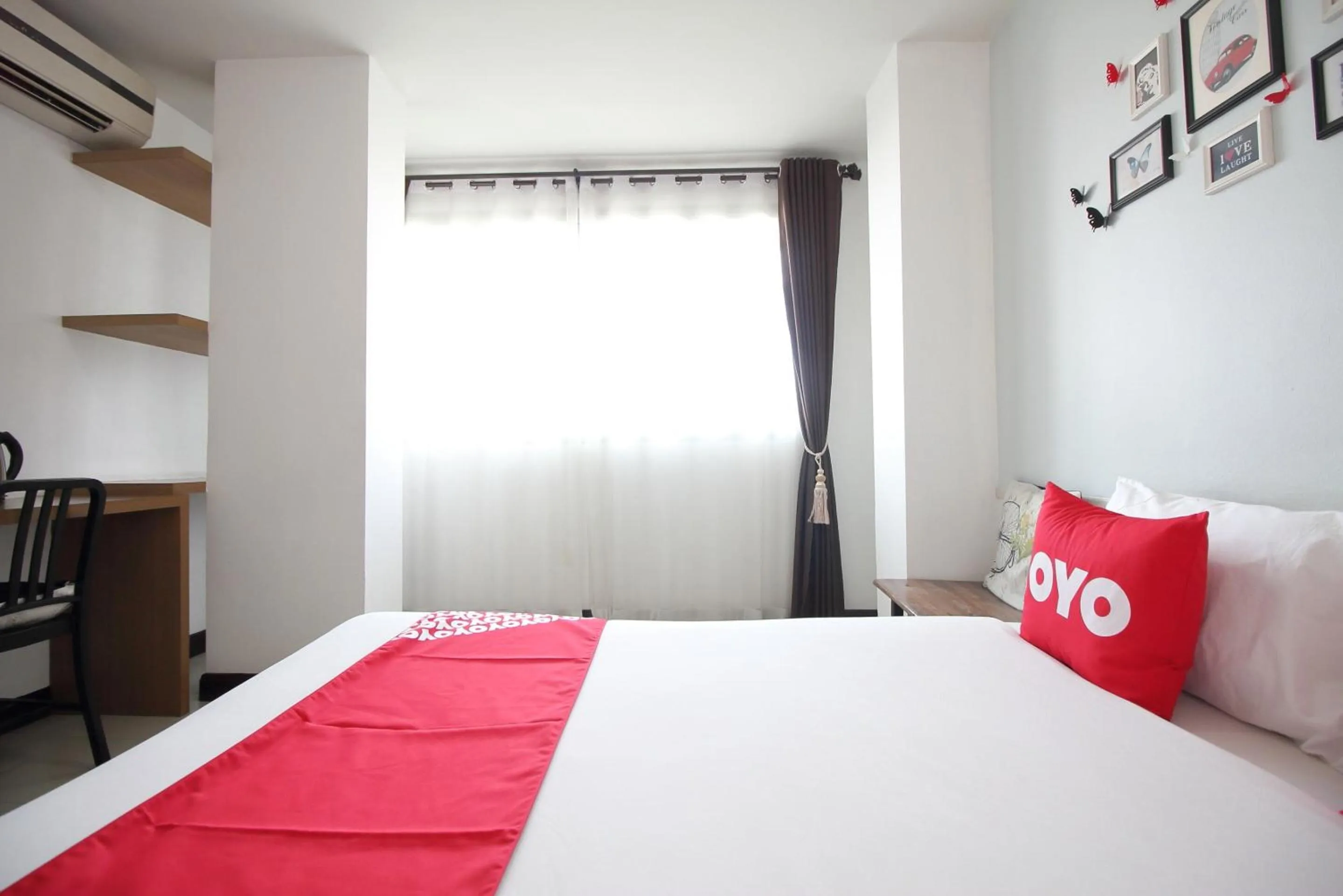 Bedroom in Super OYO Capital O 564 Nature Boutique Hotel