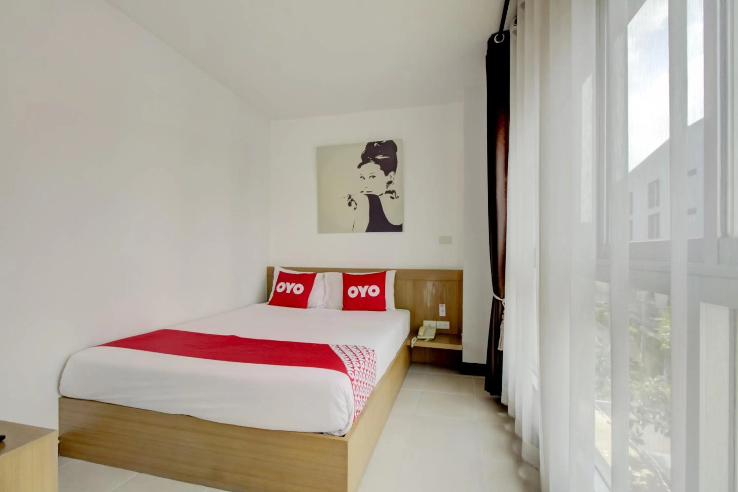 Bedroom in Super OYO Capital O 564 Nature Boutique Hotel