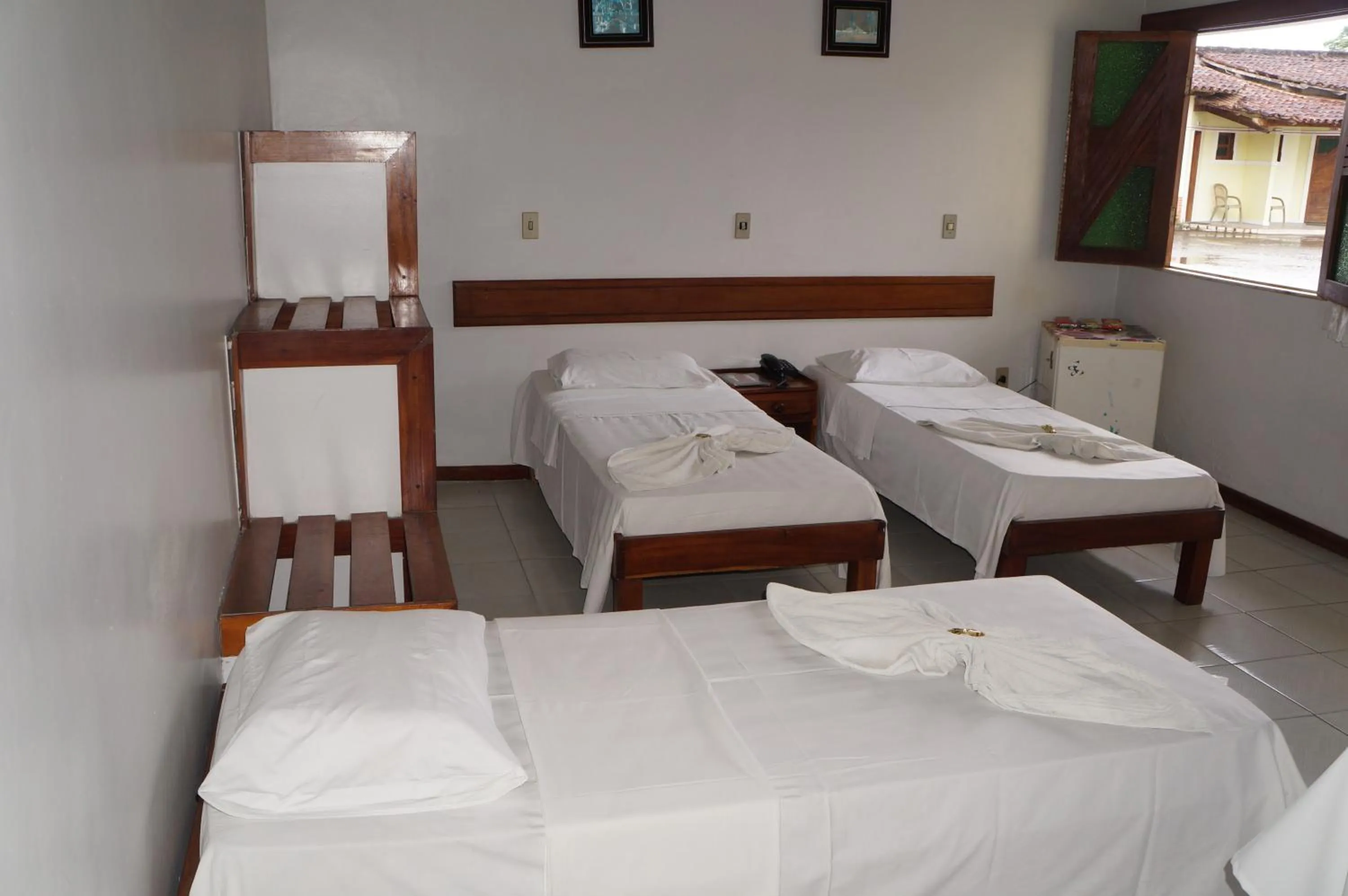 Bed in Pousada Do Bosque