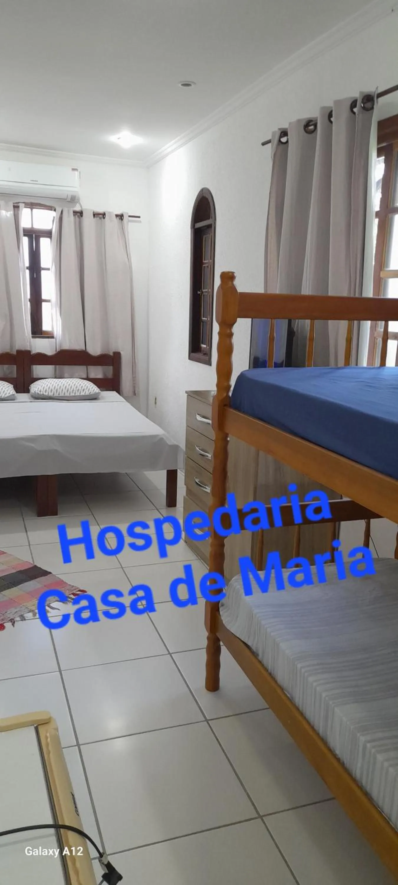 Photo of the whole room, Bed in Hospedaria Casa de Maria
